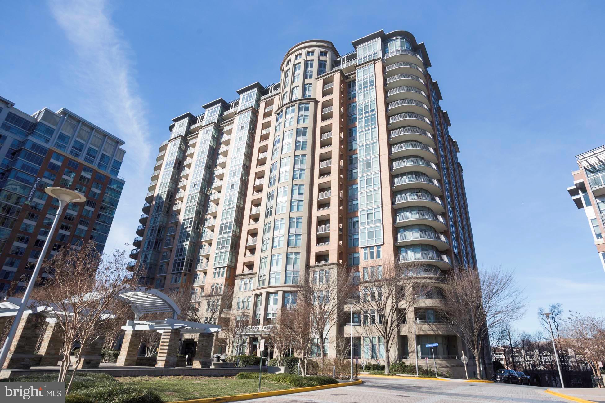 2BR 2BA Luxury Condo with High Ceilings and 2 private balconies! Beautiful view to parklike grounds. Gourmet kitchen with plenty of cabinetry, center island, stainless steel appliances and beautiful granite. Living room and dining area are bathed in light with glass door to balcony. covered patio. Primary Bedroom with luxury bath, walk in closet and windows to balcony. Second BR with walk in closet, glass door to second private balcony covered patio and gorgeous bathroom. Enjoy fantastic common areas throughout the building plus roof top swimming pool all featuring beautiful city views! Great places to entertain larger groups. This prime location is close to everything! just steps away from parking and storage . A few blocks from world class shopping plus close by grocery shopping at Wegmans and Whole Foods plus the Boro and plenty of great restaurants In the heart of Tysons Corner,. Silver Line Metro and great location for commuting to DC! You won't be disappointed!