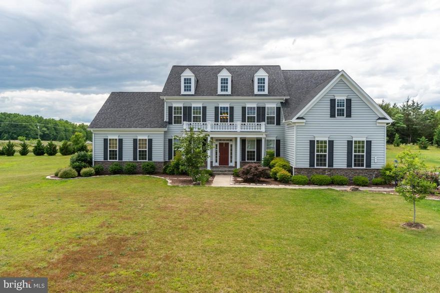 This lovely family compound offers space for multi-generational living, a home office, au pair suite and much more. Built for both upscale and comfortable family living, this home contains many upgraded features throughout its three finished levels. Every bedroom has private or private access to a full bathroom. The main level features a spacious master bedroom suite that is discreetly disability accessible. A split staircase leads you upstairs where you will enjoy a second master bedroom suite plus 4 additional bedrooms and 3 additional full baths. The family space on the main floor is open with hardwood flooring through-out. The gourmet kitchen has granite countertops, stainless appliances recessed lighting and a tile backsplash and a large center island with a second prep sink. A large walk-in pantry provides additional storage space. The lower level contains a rec room, a media room and the seventh bedroom and sixth full bathroom plus three large storage/utility rooms. Outdoor activities can be enjoyed from the spacious screened porch or patio areas and there is plenty of lawn space on the 3 acres for sports, gardening, pets, etc. The oversized driveway provides ample parking for many cars plus there is a 3-car, side-loading garage. Shopping and I95 access are just a few minutes away and you can walk to Lake Mooney where fishing, kayaking and paddle boarding can be enjoyed.