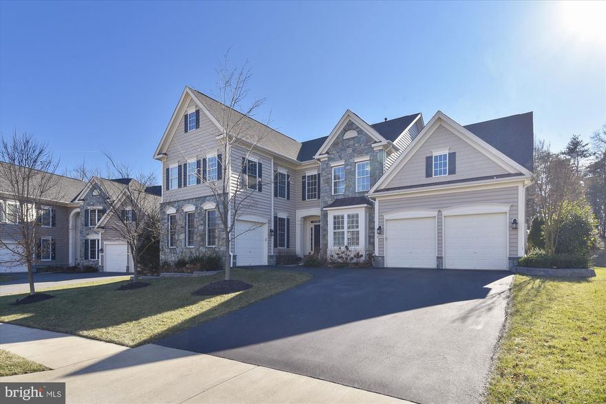 You will love coming home each day as you pull up to this stunning 5 bedroom and 4 and half bath home that is set upon a quiet cul-de-sac street. This impeccable home is located in an extremely desirable area and is only 10 minutes from the up and coming Loudoun Station Metro.Upon entry, you are immediately greeted with a spacious foyer and vaulted ceilings. The list of upgrades is practically endless, including a gourmet eat in kitchen that is outfitted with high end upgrades such as granite counters, stainless steel appliances, double oven, tall cabinets equipped with soft close drawers/doors and accentuated with beautiful underlighting. Wainscoting adds an eloquent touch to the formal dining room and continues up the solid wood staircase to the second level. Hardwood carries throughout the large owner's suite. This owner's suite has all it all, a spacious sitting area, trey ceiling, 2 large walk in closets, and luxurious double headed walk-in shower. Gorgeous expansive hardwood throughout the first and second level. The large family room is wired with 7.1 surround sound and framed perfectly by plantation shutters and custom coffered ceilings. Step into the outside oasis via the Trex decking that leads to a lower level patio, a combination that is perfect for entertaining all year round. With the Included landscape lighting - the house house looks stunning day or night. The Spa can be enjoyed in any season and the custom fire pit will keep you warm in the winter, cook your smores in the summer, and have ample seating for friends and family. Property is completely irrigated with lawn and beds maintained by world class landscape service.All bathrooms are finished with high end fixtures and include soft close drawers/ doors for all vanities. Finished walk-up lower level boasts a fully equipped custom gym, sauna for post workout relaxation, and a den with full bath to accommodate guests. The wet bar is complete with a GE monogram fridge, granite counters and conveniently located next to the custom Theater room, where you will enjoy oversized plush theater seating, 7.1 surround sound, and large viewing screen to take in your favorite movies or sporting events. The home is equipped with energy efficient LED bulbs in all recessed lighting along with cat 5 cables carrying giga bit internet throughout the home, ensuring the best signal no matter your location within the house. This home is truly turn key and has been meticulously maintained. Hurry, not to be missed.