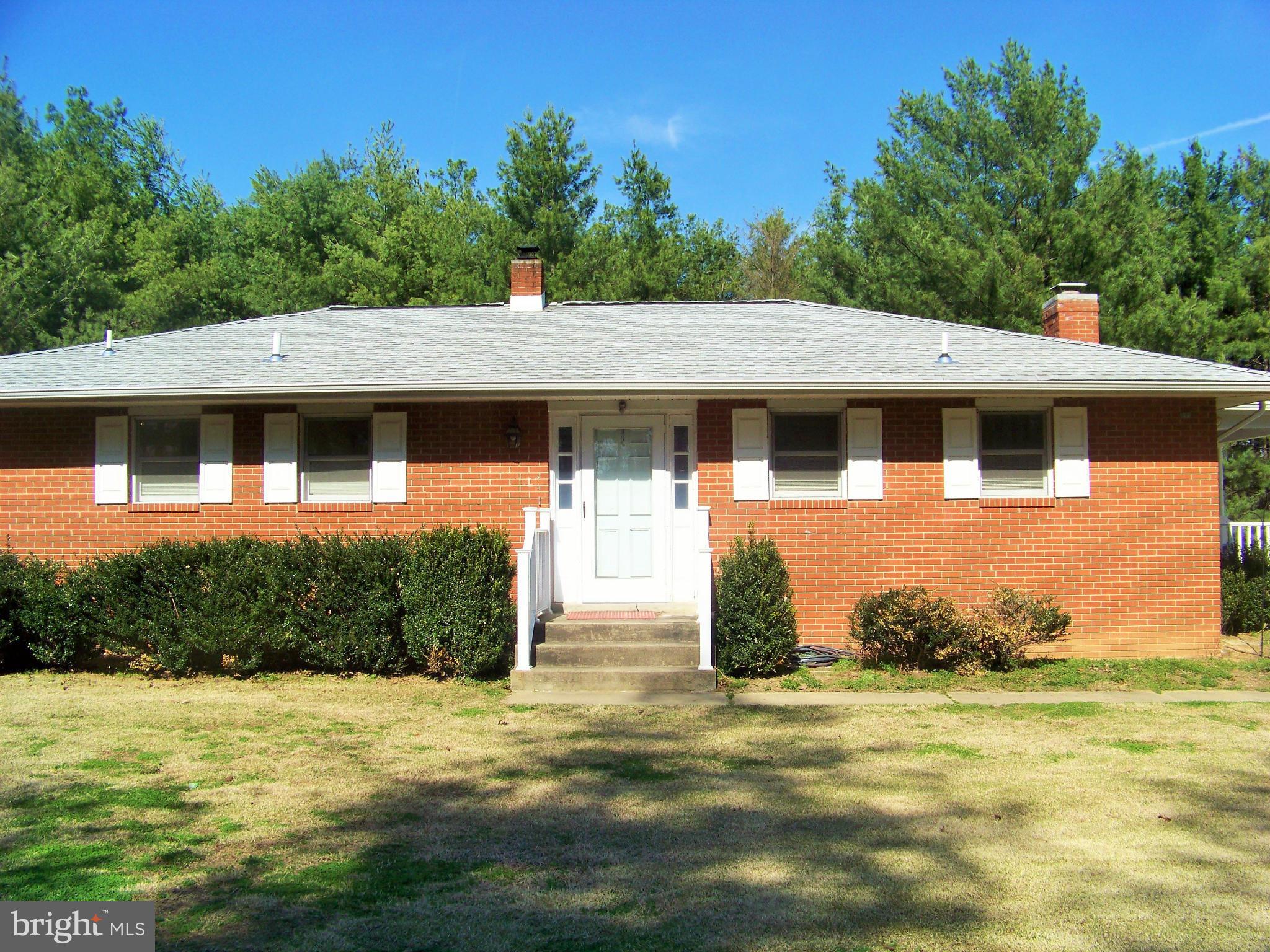 Well taken care of home on 3 acres surrounded by beautiful trees for privacy in Waldorf! This gem has fresh paint, refinished hardwood floors (original) throughout the main level. Kitchen and foyer has new flooring and solid wood cabinets. Recently remodeled basement is a must see that includes Amish solid cherry doors, trim and mantle! Updated bathroom with pebble floor. USDA eligible