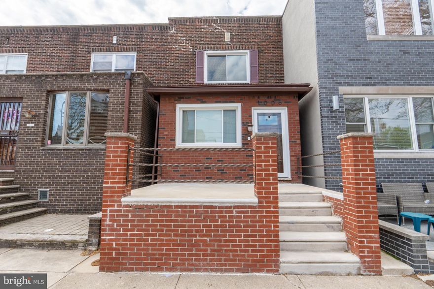 Welcome to 1006 Johnston St where you just need to unpack your bags. This very welcoming home is located in Marconi East. As you enter this Beautiful Home there are lovely Wood Floors, with a spacious Living Room. The Kitchen has Cherry Wood cabinets & Stainless Steel Appliances, range, refrigerator, microwave, garbage disposal. Step out back to this Perfect Yard that has a Great Deck and fencing all around. as well as plenty of room for BBQs & Entertaining. The upstairs has two spacious rooms with plenty of closet space. Finally relax in the custom bathroom that has a double Vanity, Stall Shower and Jacuzzi Tub. Basement has a Laundry Area with washer and dryer. Plenty of Storage Space and Ceiling Height in the basement as well. Other Great Features about this home is the Central air, new windows and doors and Filtration for the water. LOCATION is amazing, its just a Few Blocks from the Philadelphia Sports Complex,Stadiums, Restaurants, and very transit oriented.