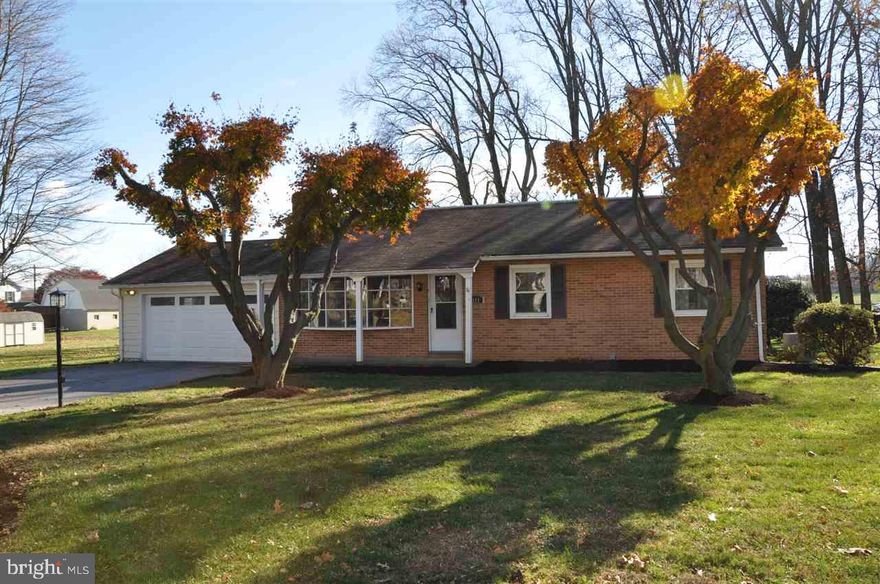 Move right in! Brick rancher in beautiful rural location on tree lined street. Recently renovated interior with custom kitchen and flooring. Full finished basement, 2-car garage, and central air conditioning. 1yr home warranty included.
