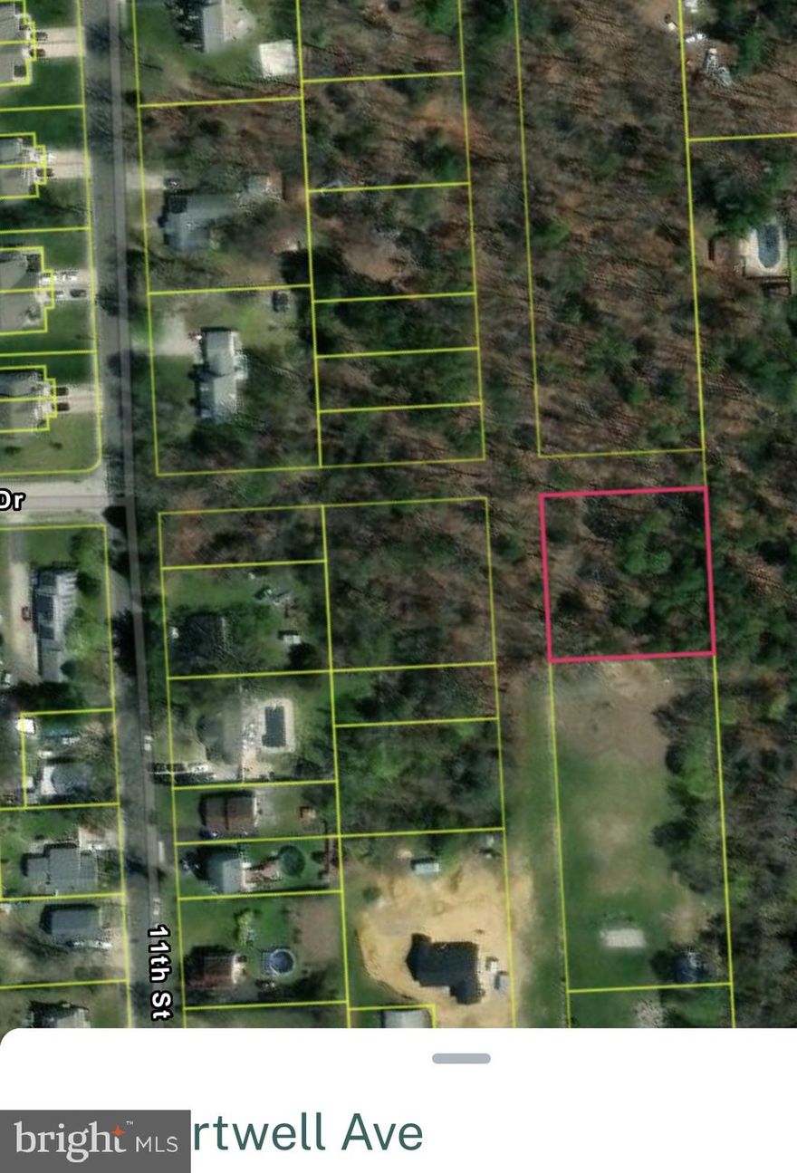 40 Hartwell ave- do not use google maps as it is wrong. As per town this lot is buildable. 1 of 3 buildable lots for sale from seller. Off of 11th st there is a paper rd, High St, which runs back to Hartwell ave. This lot is 150 frontage by 149 foot deep.  Water and sewer have been run back to these lots by town. Buyer must pave rd to access lots. Sign out front of paper rd