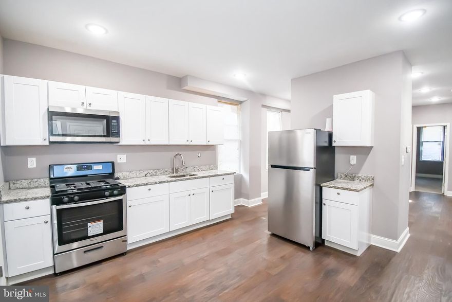 Buyer failed to perform. BACK TO THE MARKET THIS GEM WONT LAST LONG!!!! Perfect opportunity to own a fully rehabbed 3-unit property. Property Description: Unit 1= 2 bed 1 1/2 bath with a deck off the kitchen and washer dryer hookup. This unit also has a private entrance and exit. Unit 2= 1 bed 1 bath with washer dryer hookup. Unit 3= 3 bed 1 bath with washer dryer hookup. All units are separately metered, have granite countertops and stainless-steel appliances.  Great for an investor or house hacker live in one unit and rent the other two. All units are vacant!
Professional Photos coming soon