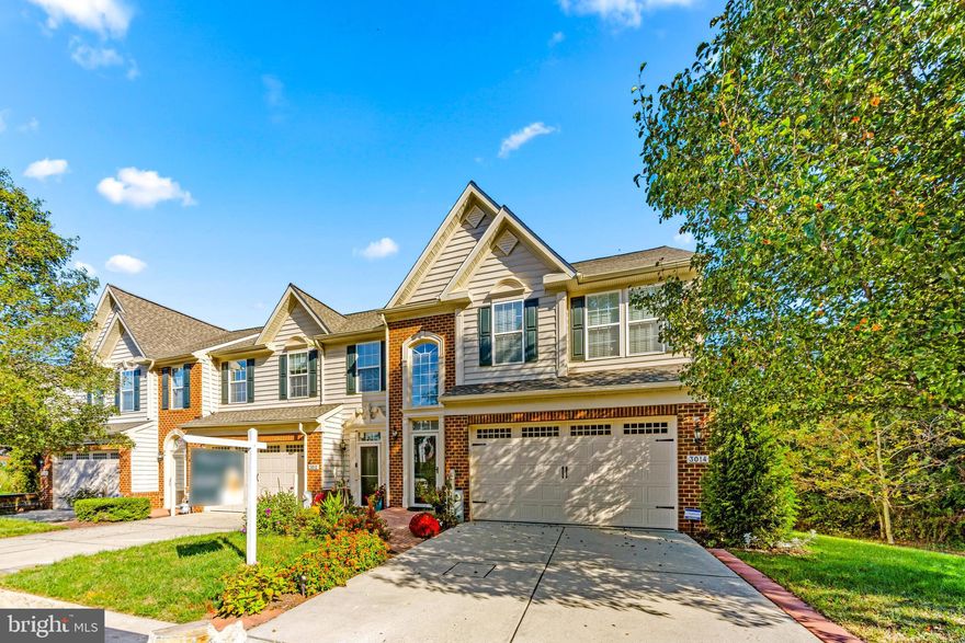 Welcome to this spacious and light-filled end-unit villa located in a vibrant 55+ adult community offering fantastic amenities including a pool, tennis courts, walking paths, clubhouse, and more.

Nestled in a serene, park-like setting with mature trees and open green space, this home offers privacy and natural beauty. Enjoy peaceful mornings on the deck overlooking open space or admire the views from the kitchen’s large bay windows.

Inside, the open floor plan features soaring ceilings and a welcoming two-story foyer. The large kitchen includes a center island and breakfast nook, flowing into the dining and living areas where a stunning stone gas fireplace creates a warm and inviting space — perfect for gatherings or quiet evenings.

The lower level is designed for entertaining and versatility, with a theater-style setup, bar area, full bathroom, and a private office space.

Enjoy a spacious main level primary that is perfectly appointed with a large closet and open spa-like bathroom.

Upstairs, you'll find two spacious bedrooms, a full bathroom, a large loft, and a charming bonus room — ideal for hobbies, reading, or additional workspace.

Additional features include a 2-car garage, driveway parking, and available street parking. This home offers comfort, style, and a low-maintenance lifestyle in an amenity-rich community.