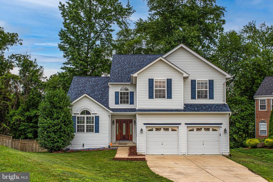 Stunning and Beautiful home with over 4,000 finished square feet, located on a premium lot, backing to trees in the sought-after Ashford Oaks neighborhood! First floor primary bedroom suite with access to rear deck. Features large walk-in closet, luxurious bathroom with ceramic tile, dual vanity, jetted tub, separate shower and water closet. Gourmet kitchen with granite, stainless steel appliances, gas stove with convection oven, upgraded maple cabinets, built-in wine rack and center island that overlooks the breakfast area that leads out to the dual deck with steps to the private backyard. Separate dining room with vaulted ceiling, custom molding and built-ins. Family room features a 2 story ceiling with fireplace. Laundry/mud room with utility sink. Upper level features 4 spacious bedrooms and hallway bathroom. Huge fully finished basement with full size windows, recreation room, media room with surround wiring, full bathroom rough-in and plenty of finished space is perfect for relaxing, entertaining, as an in-law suite, home office or home gym, in addition to unfinished storage area. Potential 6th bedroom with closet and small window. Exterior basement exit. Newer roof, appliances and HVAC. Escape the city life and enjoy this relaxing retreat within commuting distance to the city. Close to shopping, restaurants, grocery stores, boutique shops, library, hiking/biking trails and University of Maryland Charles Regional Medical Center. Enjoy golfing at the White Plains Regional Golf Course, ice skating or rock climbing at the Capital Clubhouse, exploring local wineries and breweries or catch a minor league baseball game at the Blue Crabs Stadium. Conveniently located to Joint Base Andrews, Pentagon, Bolling, MD-5, I-495 Beltway, Washington, DC, Virginia, commuter bus lots and Branch Avenue Metro station. Don't miss out on this amazing opportunity to make this beautiful house your home! *** Offer deadline Saturday, June 18, 2022 at 5pm. ***