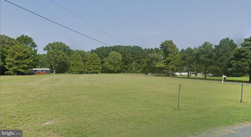Discover this 2.98-acre cleared lot on Old School Street in Bivalve, MD. The property previously had a home on it, offering potential value for future development. There are no county records available regarding the existing well or septic. This lot provides a great opportunity for someone looking to build a home in a quiet rural setting while still being within a short drive of the Nanticoke River and the amenities of Salisbury. All sizes and taxes are approximations.