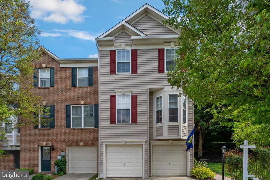 This spacious end unit townhome sits in a beautiful setting with a private landscaped backyard oasis.  Enter through the lower level where you will find a wonderful space with endless options.  Perhaps you are looking for a home office, workout room, or simply a family room- this finished lower level has been updated with new luxury vinyl plank flooring.  Head up the stairs to the main level where you will find a large Dining room and Living room (both with bay windows), a gas fireplace, beautiful hardwood floors, a half bathroom, an updated kitchen with an island and stainless steel appliances.  Continue through the kitchen where you can enjoy a bonus breakfast/sunroom with sliding glass doors leading to the deck.   Retreat upstairs where you will find a master bedroom with a walk-in closet, an attached master updated bathroom with double vanities, a soaking tub, a brand new skylight, and separate stand up shower.  The upper level also boasts 2 additional bedrooms, another full bathroom, and upper level laundry for your convenience.  Also featuring: 2 Car garage, a fenced in back yard with a deck, patio, and unique fish pond, and a brand new roof as of April 2022 complete with new skylight, gutters and downspouts.  Schedule your showing today!