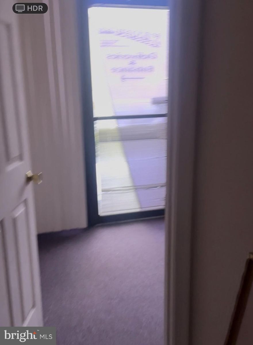 Great Office Space with two separate entrances, small warehouse area with 9' garage door and 2 bathrooms.