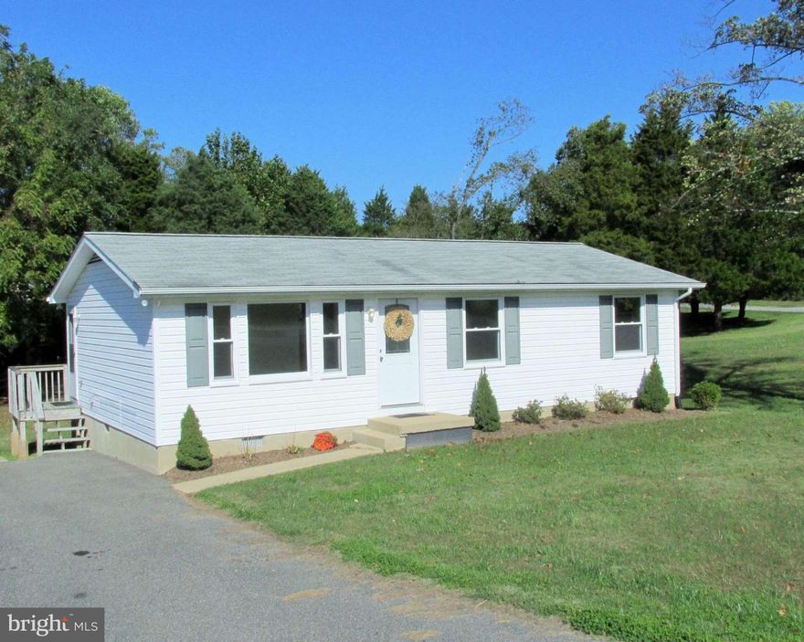 1-level living on a sunny corner lot in Chesapeake Cove Estates - not part of the CRE. This 3BR, 1BA cozy home on over half acre corner level lot. House has all the upgrades to make this the perfect starter or retirement home. Large deck(16x16); shed(12x10); and ample of parking. Add a garage or addition. Don't miss this one! Ask about our Lease with the right to purchase program.