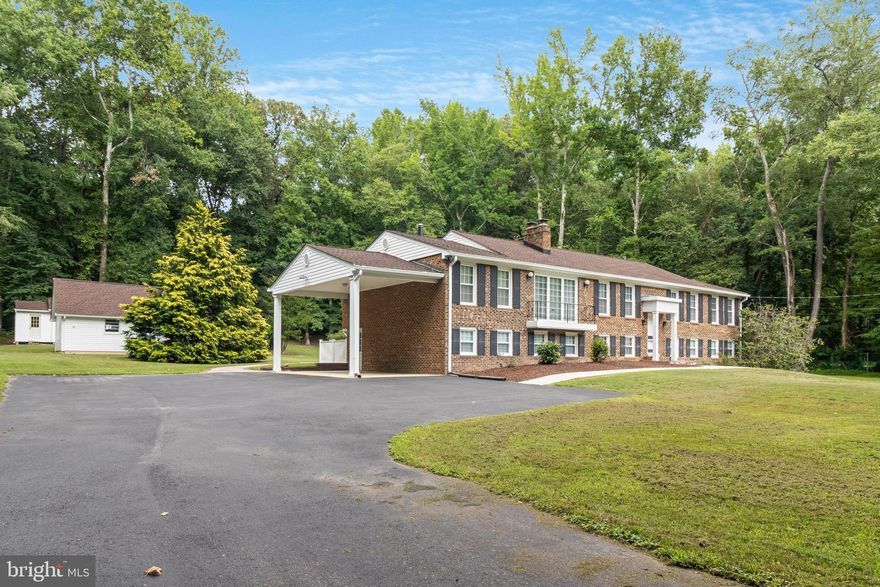 Nestled on an expansive 1.70-acre lot, this remarkable home exudes charm and potential with over 4466 square feet of living space. As you step inside, you are greeted by the spacious layout that boasts four bedrooms and three full baths. The owners have thoughtfully added an addition that enhances every room, creating an oversized dining area, a cozy family room, a vast eat-in kitchen, an exceptionally large pantry, and a living room complete with a bar and wood fireplace. The lower level offers plenty of flexible space,  providing endless possibilities for customization. Numerous thoughtful touches can be found throughout the property, including new roofs on both the main home and other structures, ensuring durability and peace of mind. Outside, the property shines with an extra-large sealed parking pad, an oversized detached garage, and additional secure storage options. The backyard oasis beckons with a beautiful brick paver walkway leading to a charming patio and a Trex deck, perfect for enjoying the serene surroundings. Embrace the freedom of no HOA restrictions, allowing you to bring your cars, RVs, boats, and more. Situated in the heart of La Plata, this home offers easy access to modern conveniences such as schools, libraries, restaurants, boutique stores, and the Charles Regional Medical Center. Additionally, the proximity to marinas, parks, and recreational areas ensures a lifestyle of leisure and enjoyment. Convenient commuter routes to Washington, DC, and Virginia make this location ideal for those who value accessibility. Immerse yourself in the pride of ownership that radiates from this well-maintained property, where every detail has been carefully considered to create a truly special place to call home.