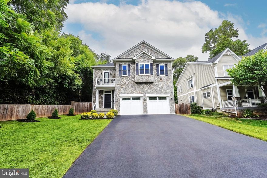 Built from the ground up in 2018, this beautiful, one-of-a-kind, completely custom-made dream home was designed for looks, form, and function! This like-new, stone-front, craftsman-style, single-family home in the heart of Falls Church is situated on roughly 0.20-acres, has no HOA, and DEFINES luxury living.--------Come home to serene silence and tranquility and enjoy ALL of the features and details this home generously offers. From anywhere in the WORLD with Wi-Fi access, Nest and MyQ apps let you control your Nest Smart thermostats, locks, cameras, AND garage doors! Parking is also easy in the oversized 2-car garage and the 1,500 square foot brand-new driveway (May 2025) that fits 6 cars. Step inside to the fully-appointed mud room that has plenty of storage and a custom shoe closet---------Don’t let the tax record fool you! This spacious home boasts roughly north of 5,000 square feet across 3 floors, and includes 5 bedrooms (all of which have custom closets and can easily fit a king-sized bed!), 4 full baths, 1 half bath, solid-wood/solid-core White Oak doors, and waterproof LVP flooring throughout the house. To top it off, enjoy soaring 9-foot to 11-foot ceilings, gas cooking, and a PERFECT layout designed for both entertaining and intimate moments.---------Did I mention the DREAMY kitchen that has beautifully-accented wood paneling? Enjoy Viking Professional appliances, quartz countertops, and an oversized island (8+ ft. long and 4.5 ft. wide) with seating for 4 and a wine fridge. A 4-burner gas range with center griddle and a never-used oven sits beneath a vented hood. Generous storage awaits in the white cabinetry accentuated with copper handles.---------Your largest sofa would be right at home in the living room directly across from the kitchen. With a built-in recessed fireplace positioned below a nook that perfectly fits the 85” TV, you’ll never want to leave! This centerpiece is adorned in natural off-white stone that perfectly ties in with the matching large dining room’s accent wall. The dining room itself effortlessly fits an 8-person table and a sideboard buffet, and can be found to the side of the kitchen. With a lovely layout like this, everyone can feel together, all while still having their own space.---------Travel upstairs to 4 bedrooms, 3 full baths, and a laundry room with folding space, utility sink, and a storage closet with power. Now for the primary suite! With tray ceilings, a HUGE walk-in closet, and a natural-stone statement wall, you can enjoy the well-designed recessed fireplace and 85” TV from your Cali-king bed! The sophisticated ensuite bathroom features an extra-long double vanity, and an elegant chandelier that hangs over the freestanding soaking tub (hand shower included). There is also a large walk-in shower with a seat and multiple shower heads, including waterfall. Your spa-like experience awaits!--------Travel down to the walk-out basement where you will find a legal bedroom with a walk-in closet, a full bath, and a wet bar with a wine fridge. For peace of mind, the dual Carrier HVAC systems, 50-year-shingle roof, triple-glazed Anderson Fibrex windows, and water heater were all installed in 2018. For outside entertainment, you can find a flagstone patio and a built-in grill with counter space---------Plus, be close to it ALL! The home is near many major hot spots and roads such as Rt. 29 (2 miles), 66 West (0.6 Miles), 66 East (0.7 miles), Rt. 7 (0.4 miles), Falls Church City (0.4 miles), Mosaic District (2.7 miles), Tysons Corner (2.5 miles), and West Falls Church Metro Station (0.8 miles). Not even a BLOCK away, you’ll find the Poplar Heights Rec Center and the W&OD Trail! The schools (top-rated by USA Today and Niche) are Shrevewood Elementary (Niche A), Kilmer Middle (Niche A), and Marshall High, known for its International Baccalaureate program (#6 by USA Today in ALL of Virginia; Niche B+). If there’s only one place for you to call your sanctuary, this is the one!!