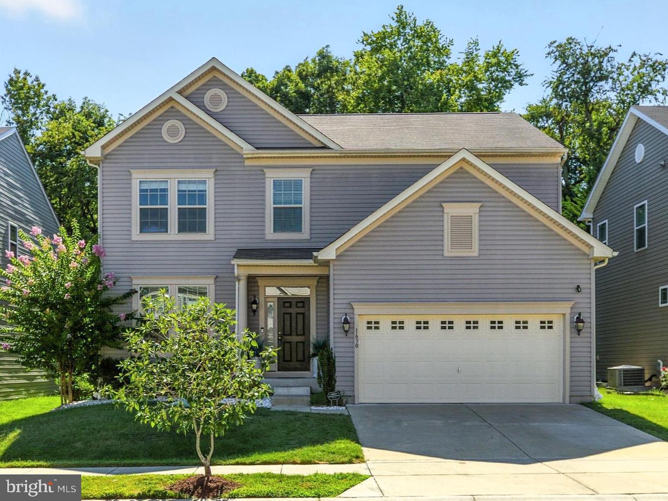 **Welcome to Harmans Ridge, where modern living meets timeless Colonial charm!** Built in 2018, this stunning 3-level home offers **6 spacious bedrooms, 3.5 baths, and more than 3,600 finished square feet** of versatile living space. Perfectly positioned on a **quiet, non-through street with sidewalks**, this home provides both privacy and community appeal.
Step inside and you’ll immediately notice the thoughtful upgrades. The main level boasts a **gourmet kitchen with a gas cooktop, double wall ovens, crown molding, and abundant cabinet space**—a dream for both everyday cooking and entertaining. The open floor plan flows seamlessly into the family room, where a **stone gas fireplace** serves as the focal point, creating warmth and ambiance year-round. A sun-filled dining area and additional living spaces make this level as functional as it is inviting.
Upstairs, retreat to the **oversized primary suite**, complete with **double closets and a spa-inspired bath** designed for relaxation. Three additional bedrooms and two full baths provide plenty of space for family, guests, or home office needs.
The fully finished lower level expands the living area with a **large recreation room, a sixth bedroom, and a full bath**—perfect for a guest suite, gym, or media room. Walk out to the rear yard, where you’ll find a **deck overlooking trees and greenery**, offering privacy and a peaceful backdrop for outdoor gatherings.
Additional highlights include a **2-car garage, walkout basement, public utilities, and an HOA of just \$76/month.** The community is ideally located near **Fort Meade, NSA, shopping, dining, and major commuter routes**—making everyday living as convenient as it is comfortable.
This home truly delivers on space, upgrades, and setting. **If you’ve been searching for a home with room to grow in Anne Arundel County, this is the one you’ve been waiting for!**