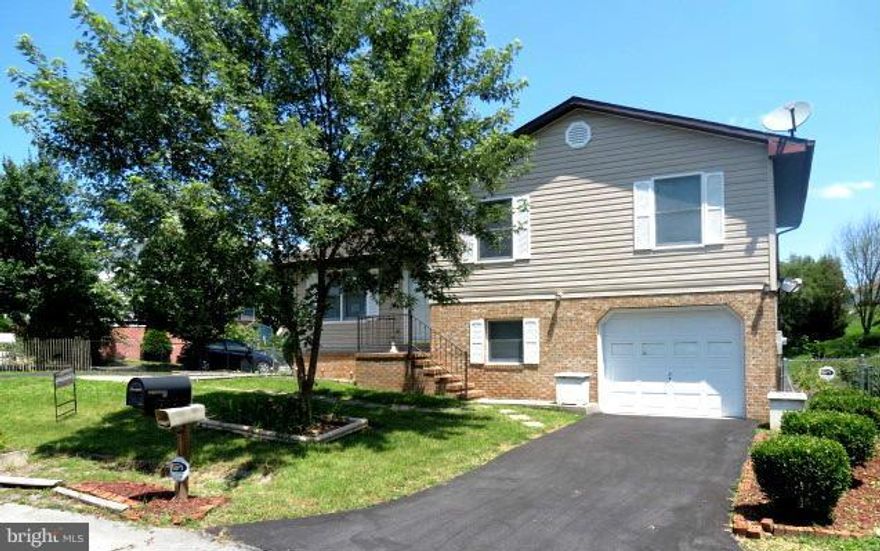 REDUCED! Nice Split Level on a cul-de-sac! Located in the surroundings of Martinsburg, West Virginia. Great starter or downsizing home. 3 Bedrooms and 2 Bathrooms and one car garage. New microwave and stove. Deck & large fenced backyard with a shed plus a carport/shed for extra storage with two front driveways. House is close to schools, dining areas, shopping mall, hospital & only min. from I-81