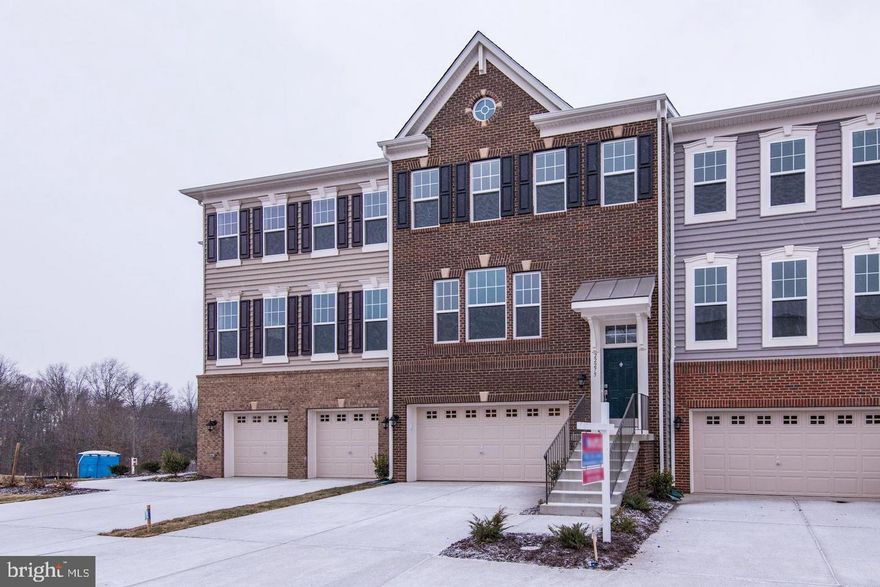 East Facing Gorgeous TH in Excellent location in Ashburn! Beautiful open floor plan in the Main Level with Harwood Floors, Gourmet Kitchen and Deck! Very bright and sun filled property! Spacious bedrooms on upperlevel with easy access laundry! Large Recreation Room and Bedroom with Full Bath in Basement. Walk out!!