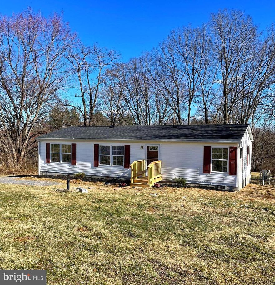 IT'S BACK!! Sellers temporarily took off the market to address previous feedback on showings concerning the home. This ranch style home has been recently updated and sits on .86 acres! This 3 bedroom 2 full bathroom home features new flooring and paint throughout, new furnace, new dishwasher, updated bathrooms with new toilet and vanity, new AC unit, and a new roof. The master bedroom features a large master bathroom offering you plenty of extra space perfect for storage. The open concept living room and kitchen area offers you plenty of space to spread out, yet still feeling included. Off of the kitchen you will find a laundry area for your washer and dryer and a door that leads you out onto the back deck where you can enjoy the views of your spacious back yard. Make this home yours to call your own!