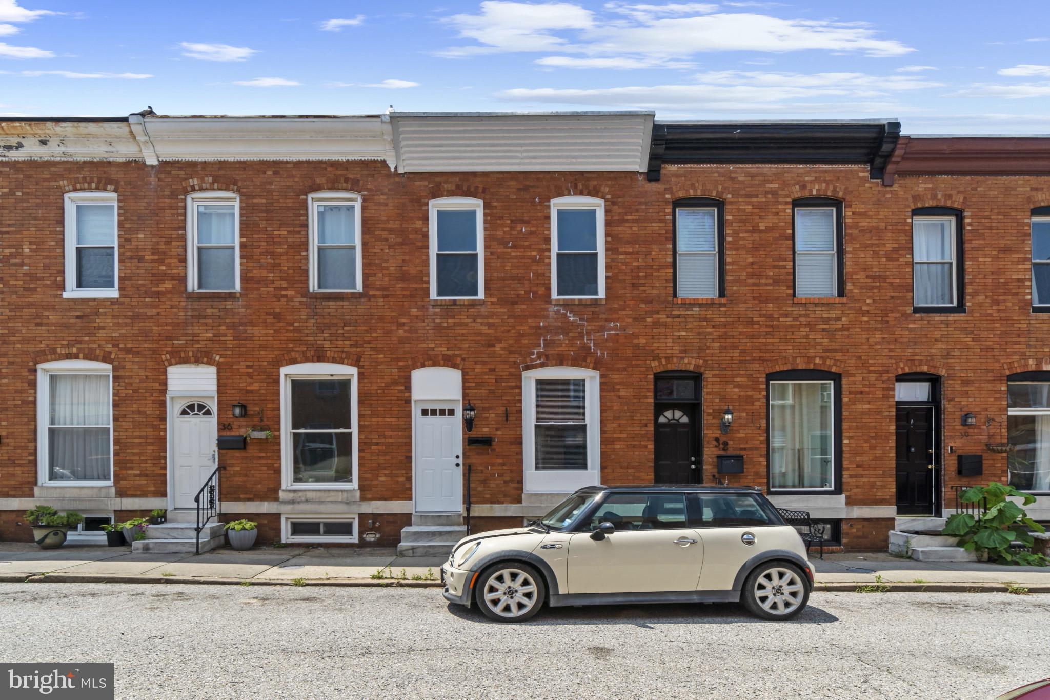 Welcome to this completely renovated three-bedroom, three-bathroom townhouse in the charming Highlandtown neighborhood. This 1,560 square foot gem has been thoughtfully updated with modern touches that'll make you feel right at home from day one.
Step inside to discover luxury vinyl plank flooring flowing seamlessly throughout the space, complemented by fresh paint that gives every room a crisp, clean feel. The heart of the home features a stunning kitchen with gleaming quartz countertops and elegant white shaker cabinets that provide both style and ample storage.
The thoughtful layout includes two primary bedrooms upstairs, each offering comfort and privacy. But wait, there's more – an additional bedroom in the basement comes with its own full bathroom, perfect for guests, a home office, or that creative space you've been dreaming about.
When you're ready to unwind, step outside to your private parking pad in the back, which doubles as an entertaining space for barbecues and gatherings.
Location matters, and this home delivers. You'll find yourself conveniently close to ALDI for grocery runs, Two Rivers Park for outdoor recreation, and quality educational options nearby. Public transportation access makes commuting a snap.
This property combines the warmth of an established neighborhood with thoroughly modern amenities. Whether you're starting out, scaling up, or looking for your forever home, this townhouse offers the perfect blend of comfort, convenience, and contemporary living in one of Baltimore's most desirable areas.