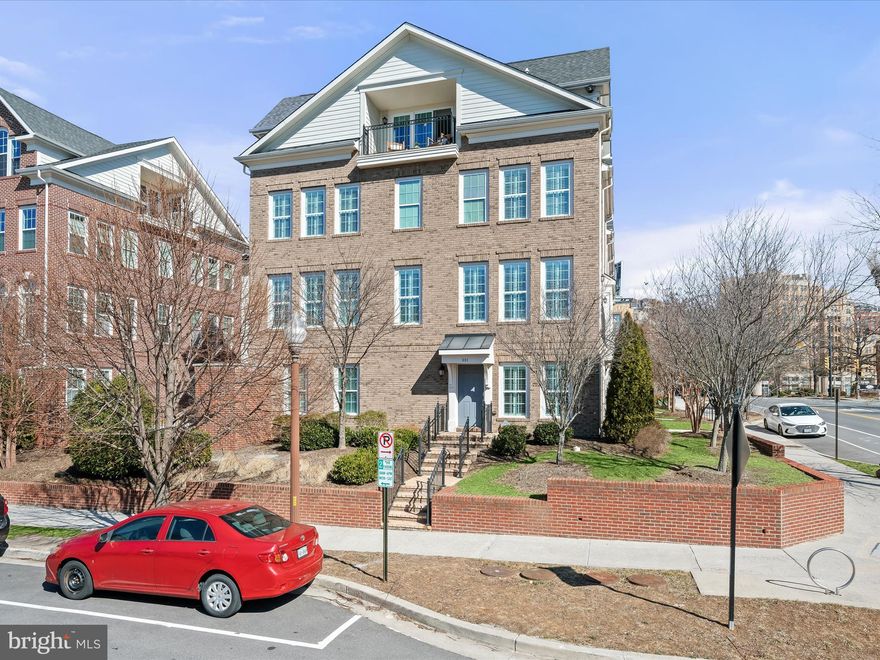 *Just Listed & Open Sun 1-4PM* Located just steps from everything Ballston has to offer, this beautifully renovated 4-bed, 4.5-bath sun-drenched end-unit townhome in Ballston Park is perfectly situated for easy access to Ballston Quarter, Target, grocery stores, boutique shopping, top restaurants, fitness centers, and less than a half mile to Ballston Metro. With over 2,700 sq ft of updated living space, you'll enjoy the best of both convenience and comfort. The main floor features a 2-car garage and a welcoming family room with heated floors. On the second level, you’ll find an impressive renovated kitchen with crisp white cabinets, stainless steel appliances, a large island with pendant lighting, and an eat-in space perfect for casual dining. This level also includes a half bath, plus a spacious living and dining room with a cozy gas fireplace—ideal for entertaining guests or relaxing at home. The third level offers a serene primary suite, a spacious laundry closet, and a second bedroom with an ensuite bath that could easily serve as an office. The top floor boasts two spacious bedrooms, each with its own ensuite full bathroom, plus a sitting area overlooking a quiet rooftop balcony—perfect for unwinding. Other updates to note include a replaced washer & dryer, new AC condenser and compressor, custom plantation shutters, all new kitchen appliances, new carpet in secondary bedrooms, new garage opener, and garden-level heated ceramic flooring. Freshly painted throughout and with new carpeting, this home is move-in ready and waiting for you! Open house on Sunday, March 2nd, 1-4pm.Offer deadline Tuesday at 12pm.
