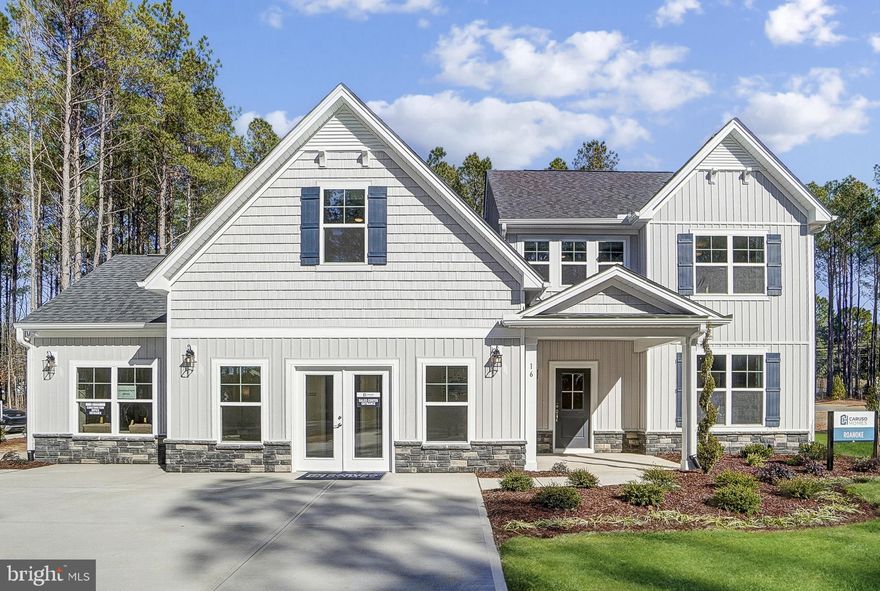 TO BE BUILT. NEW CONSTRUCTION. Beautiful lot Co-Marketed with Caruso Homes. This model is the Roanoke with a large Front Porch leading to the Foyer and Study.  The Family Room has an optional vaulted ceiling and fireplace, and openly connects to the Dining Room and Kitchen. The Gourmet Kitchen has a large island, kitchen backsplash and Walk-In Pantry. The Laundry Room is conveniently located on the first floor. The Owner's Suite is also on the first floor and connects to a Walk-In Closet and Owner's Bath which features a tub and walk-in shower. The remaining bedrooms are on the  second floor, along with an Open Loft and generously sized Attic Storage. **Photos of a similar home are used for representation only and may show options/features that are not included in the price of this home.
Buyers may choose any of Caruso's models that will fit on the lot, prices will vary. Photos are provided by the Builder. Photos and tours may display optional features and upgrades that are not included in the price. Final square footage is approximate and will be finalized with final options. Upgrade options and custom changes are at an additional cost. Pictures shown are of proposed models and do not reflect the final appearance of the house and yard settings. All prices are subject to change without notice. Purchase price varies by chosen elevations and options. Price shown includes the Base House Price, The Lot and The Estimated Lot Finishing Cost, Elevation 3 with Stone, Bonus Room and Ensuite Bedroom 2. Builder tie-in a non-exclusive. Showing- Contact Caruso Homes. Enjoy the Clubhouse and Pub, the 18-Hole Championship Golf Course, the Driving Range, the Pro Shop, Community Pool, Tennis and Pickleball Courts, the shoreline Osprey Bar, Walking Trails, Marina and More. Historic Cobb Island is hereby with its restaurants and activities too!