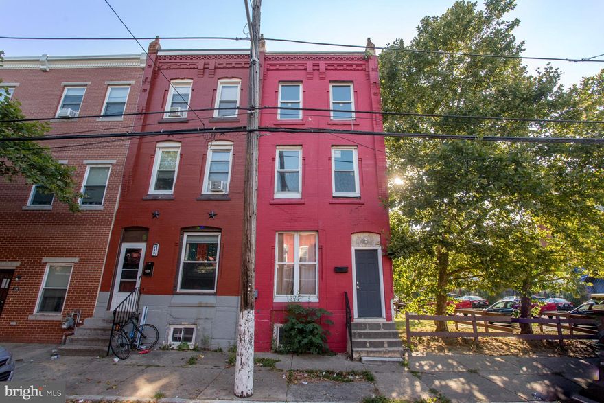 Don't miss out on this newly remodeled, end of row, 6 Bedroom, 2 full bath home! Brand new laminate hardwood flooring and paint throughout. Enter to the foyer which leads to the living room & dining room with recessed lighting, kitchen with new cabinetry, granite countertops, stainless steel oven with hood vent, new refrigerator and main floor laundry. The 2nd level features 3 bedrooms with new carpeting, paint, and lighting throughout and 1 updated ceramic tiled bathroom. The 3rd level hosts 3 more bedrooms all with new carpeting, paint and lighting and 1 more full ceramic tiled bathroom. Close to public transportation and truly a great find!