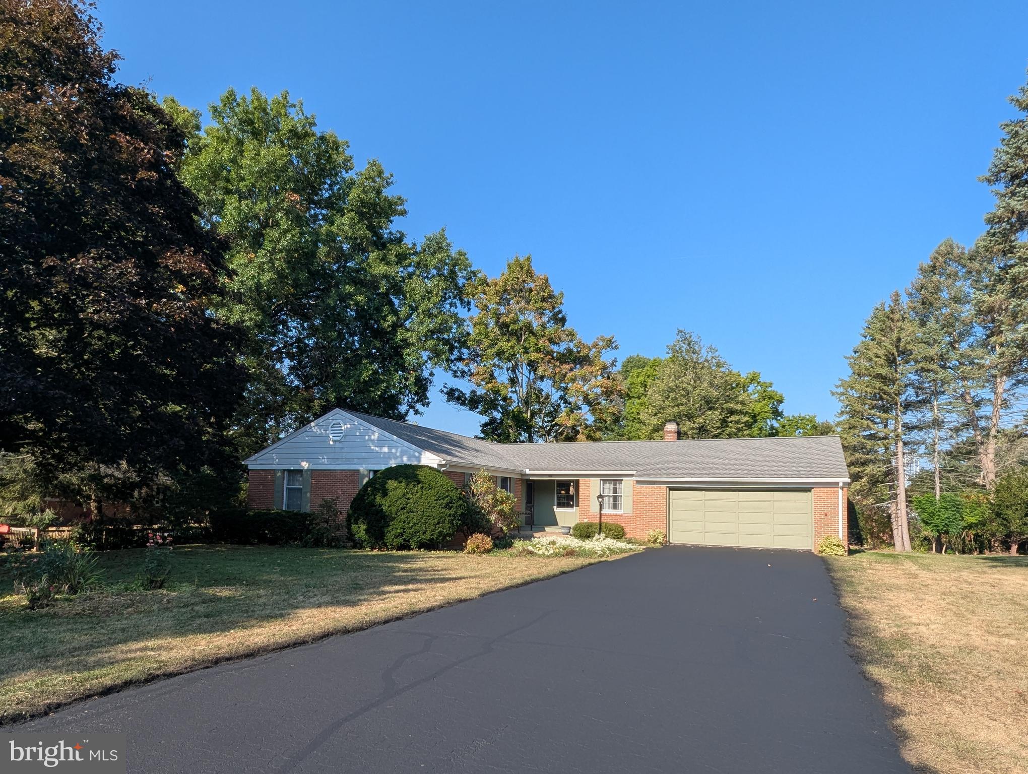 Looking for a great location? This charming, brick Ranch home is in the desirable tree-lined Dalevue neighborhood close to Centre Hills Country Club, downtown State College and historic Lemont. It’s also just a short walk to the entrance of the Dalevue Community Park and a five-minute drive to the Penn State University campus. Highlights include a covered front entry, one floor living, tile and hardwood flooring, updated bathrooms, Levolor window blinds, a new roof and water heater (both in 2023). Enter inside into a spacious Kitchen with ample cabinet space, Granite countertops, a center island, pendant lighting, breakfast table area, a wood fireplace, and patio doors leading outside for grilling and easy entertaining! Adjoining this space is a nicely sized Living Room and Dining Area with built-in shelving. Down the hall is the Primary Bedroom with walk-in closet and private Full Bathroom with tile floors and shower. The main floor also features two additional Bedrooms, another Full Bathroom, and a Laundry Room with shelving closet. The lower level features a large Family Room with wood stove, and plenty of extra storage and workshop space in the unfinished area. A Bilko door provides access up to the backyard. Enjoy the beautiful flat parcel with mature trees and landscaping from the covered screened-in back patio or from your chair on the front porch. The attached 2-car garage offers more room for yard equipment and tool space, and the recently resealed long driveway provides parking for 8 additional vehicles! Don’t miss out on this opportunity to make this home your own! Seller is offering a $5,000 painting credit with an acceptable offer.