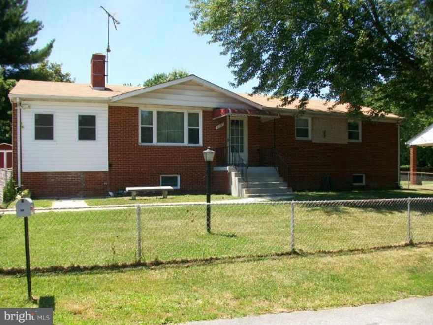 All brick rambler with large rooms. Great location.  Close to beltway and Branch Ave Metro.  Lg fenced back yard backs to trees with inground pool and brick fireplace great for family cookouts!  Possible in-law suite in basement with sink, connection for stove and refrigerator and outside entrance.  Windows, roof and AC replaced within last 10 years. Refinished hardwood floors on main level.