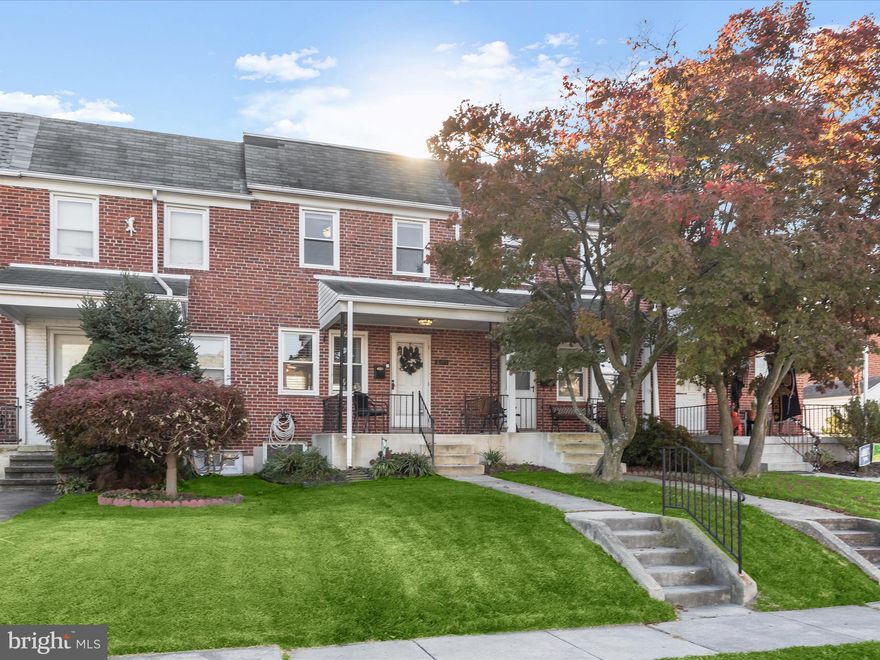 Completely updated throughout, this all-brick rowhome offers three bedrooms and one full bathroom, with a blend of modern amenities and inviting charm. A covered front porch welcomes you as you arrive and is ideal for lounging and enjoying the outdoors. Inside boasts a bright and open main level, with refinished hardwood floors in the living and dining rooms. The recently upgraded kitchen is equipped with stainless steel appliances, ceramic tile flooring, along with brand new quartz countertops, tile backsplash and cabinets. Upstairs, hardwood floors continue into the three sun-filled bedrooms, while the full bathroom impresses with a skylight and tiled tub-shower. The lower level basement expands the living space with a versatile recreation room highlighting brand new luxury vinyl plank flooring, recessed lighting and fresh paint. The utility room on this level includes laundry, storage, and stairs outside to the rear. Outside, the private fully-fenced backyard features a patio and ample space for entertaining or relaxation, making it perfect for every outdoor occasion. Other recent improvements include a new HVAC system (2024), flat portion of the roof (2024), gas water heater (2023) and privacy fence (2021).