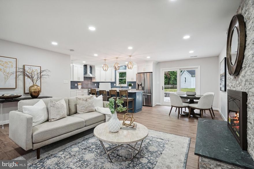 Practically all New! Completely remodeled home on half acre private lot in Lorton.  Everything has been updated including the electrical,  plumbing and HVAC. Step into this home and prepare to be wowed by the beautiful gourmet kitchen with stainless steel appliances, large kitchen island, beautiful backsplash, and high end finishes. Large owners suite with amazingly large walk in shower and giant walk in closet. LED recessed lighting throughout the entire home. Large living space in basement. 4 large bedrooms and 3 full baths. But wait there is more..... Completely finished, heated and cooled 27 x 16 foot bonus cottage in the backyard that could be a private oasis, art studio, workout room or teen hang out...endless possibilities. Amazing stone patio with fire pit for outdoor gatherings. Extra large backyard. Huge concrete driveway that could park over 10 cars. Steps away from Liberty in Lorton. Liberty is the transformation of the historic Lorton Reformatory into a vibrant urban village. There are acres to play, exercise, and gather for unique events like live music and outdoor movies. Liberty Market, the community’s retail hub, combines the best new construction with creative reuse of existing buildings to feature a unique collage of small shops in a pedestrian-friendly atmosphere with sophisticated dining options. Also Lorton Workhouse is right around the corner, a 55-acre center for the arts and arts education. Rent includes leaf removal and gutter cleaning.