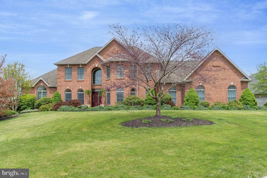 Come tour this fabulous Mumper custom-built home in the Estate Community of Lindenwood.  Step through the front door to a grand 2 story foyer.  The architectural detail surrounds you.  Tasteful arches, columns, wainscoting - and nooks to showcase your art!  To the right is the formal dining room, stylish & elegant.  Recessed lighting in the tray ceiling sets the mood for relaxed entertaining.  Tucked to the left through French doors is the library - a little gem, rich in detail.  Straight ahead is the great room with a breathtaking floor-to-ceiling stone fireplace with two intricately crafted mantels.  The flow of the floorplan design makes this space great for large gatherings and perfect for intimate groups. This fantastic kitchen offers choices!  You can cozy up to the island/breakfast bar, sit at the table, or pop out to the awesome covered deck with room enough to grill, dine and party!  Or enjoy quiet time on the deck, listening to the soothing sounds of the waterfall while you read, nap, or chat with a friend.  The chef's kitchen features granite counter tops, stainless steel appliances, and Tom Clark custom cabinets, as well as a generous walk-in pantry.  Brazilian cherry hardwood floors lead the way to the first floor owners retreat.  This beautiful suite features a double-sided fireplace next to a cozy sitting room with a wet bar.  Just off the sitting room is a private office with custom built-ins.  The primary bath speaks luxury.  Soak in the jetted tub, or pamper yourself in the oversized tiled shower with multiple shower jets.  Upstairs you'll find a second primary bedroom, plus two additional bedrooms connected by a Jack & Jill bathroom.  There's a full footprint walkout lower level that is unfinished - except for the hidden room outfitted with a stunning contemporary fireplace.  A little getaway!  This exceptional home sits on a corner lot in a lovely neighborhood - just a short walk to both the Upper Allen Elementary School and the Mechanicsburg Middle School.  Minutes to Rt 15 and PA Turnpike... and just another couple minutes to Trader Joes!