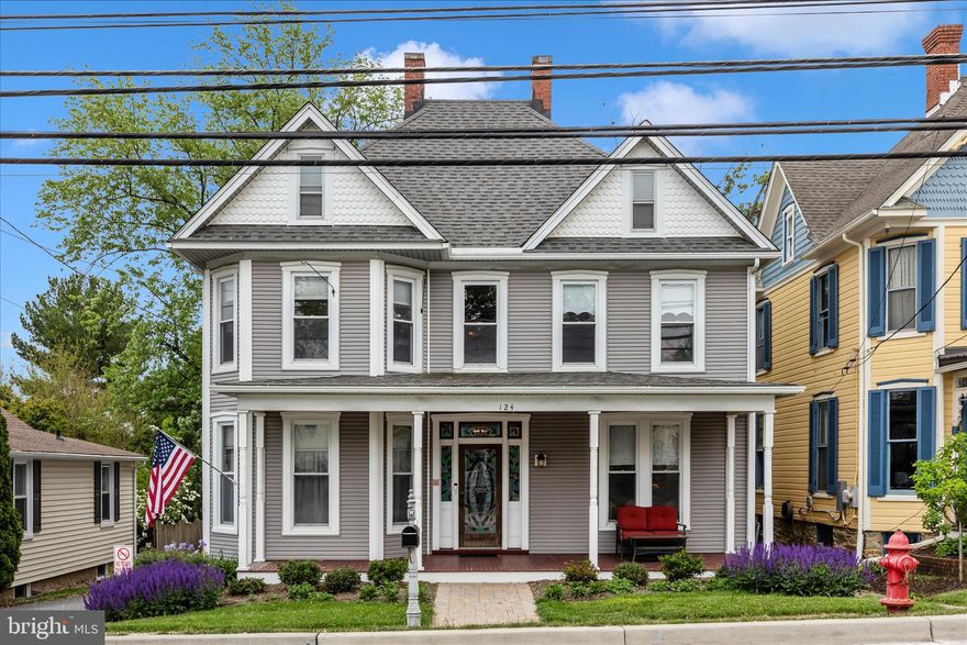 Charming Victorian Home offers the perfect blend of historic character and modern upgrades in the heart of Middletown. Vehicle access from both Beautiful Main Street and Convenient Broad Street, this home provides excellent accessibility and curb appeal. Beautiful Hard Wood Floors, Wainscoting, Crown Molding throughout. Main Level Features Separate Living Room, Dining Room w/Pocket Doors, Family Room, Kitchen, Updated Full Bath. Kitchen includes Center Island w/Seating, Gas Cook-top, and Pantry. (2024: New Refrigerator, New Gas Cooktop, New Kitchen Disposal). Upper Level Features 3 Nice Size Bedrooms. Updated Full Bath with Heated Floor, Large Glass Front Shower, Custom Cabinets, Makeup Vanity, and Jetted Claw Foot Tub. An Oversized 2nd Floor Laundry Room with a Pocket Door features a second kitchenette area including upper and lower cabinets and countertop space. New Washer and Dryer in 2022. Access to Attic and a Small room with view overlooking back yard. Property also includes a Large/Tall Detached 2 Car Garage w/Tesla EV Charger. Attached to the Garage is a Large Shop/General Use Space. Home includes a Large Rear Deck off the Kitchen. A Whole-House Backup Power Generator w/New Battery in 2026. 2 Whole-House Surge Protectors, 2 Outdoor A/C unit Surge Protectors installed 2025. 4 Propane Tanks. This Listing also includes an Attached Additional Lot of Record w/Temp Restrictions. Conveniently located near schools, shopping, dining, parks, and easy access to major highways. This well-cared-for Victorian on Main Street is truly special.