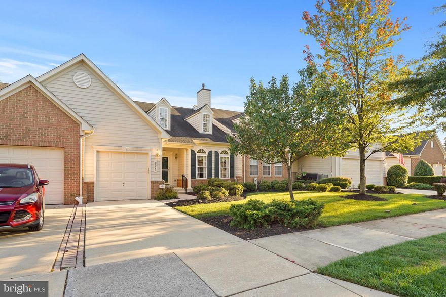 Leave daily chores behind and embrace the freedom to focus on what matters most! Welcome to The Villages at Woodholme, a highly sought-after 55+ gated community where premier amenities are tucked among gorgeous tree-lined streets and a peaceful natural setting. With nearly 4,200 sqft of total space, this 3-bedroom, 4-bath home showcases the ease of MAIN-LEVEL LIVING. The primary suite on the main floor boasts soaring ceilings, a spacious walk-in closet, and a luxurious ensuite bath. Upstairs, a versatile loft awaits—perfect for a home office, lounge, or reading nook—along with two roomy bedrooms and a Full Bath. The FULLY FINISHED LOWER LEVEL provides an expansive recreation room ideal for entertaining, plus an additional Bathroom, utility room, WALK-OUT entry and generous storage. As a resident, you’ll enjoy RESORT-STYLE AMENITIES including a community center with social events, outdoor pool, fitness center, clubhouse, library, tennis and pickleball courts, and meticulously landscaped common areas designed to support an active social lifestyle. With a superb location minutes from dining and shopping at Wegmans, Foundry Row and Trader Joe’s, your visitors will like the ease of access to I-695. Call for a Private tour! 1 YR Home Warranty.