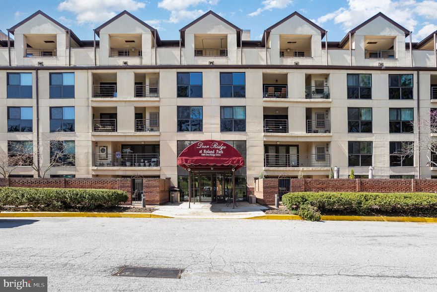 Welcome to this beautifully updated 2-bedroom, 2-bath condo boasting over 1,500 sq ft of comfortable, light-filled living space. Step into luxury as gleaming new hardwood floors guide you through a spacious open floor plan, perfect for entertaining or relaxing. The inviting living/dining area features a cozy wood-burning fireplace and French doors that open to a large private balcony—ideal for container gardening or enjoying serene Southwestern views.

The kitchen offers a generous pass-thru design so you can stay connected while hosting. Retreat to the impressive primary suite, complete with an enviable walk-thru closet/dressing room. The 2nd bedroom includes built-in closet organizers, making it a perfect home office or guest space. You'll also love the convenience of your in-unit laundry room with extra storage, plus additional large closets throughout the home.

This well-maintained building includes two elevators (though you won’t need them thanks to direct garage access to your floor), assigned covered parking, and ample guest parking. Situated just minutes from Johns Hopkins University, downtown Baltimore, the Inner Harbor, and the shops and restaurants of Hampden and Roland Park. Enjoy easy access to I-83 and the MARC train for commuting ease.

No dogs permitted. This is more than a home—it's a lifestyle of comfort, elegance, and convenience in an unbelievable location just waiting for you.