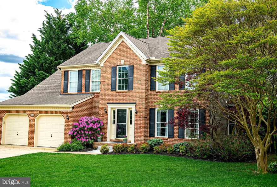 Tucked away on a quiet cul-de-sac in the highly sought-after Spenceola Farms, this beautifully maintained 4-bedroom, 3.5-bath Colonial offers over 2,900 sq ft. of finished living space with neutral paint colors and new lighting fixtures throughout giving it the perfect blend of comfort, and convenience. Step inside to discover a warm and inviting main level featuring rich hardwood floors and a light-filled layout. The heart of the home is the kitchen, complete with crisp white cabinetry, gleaming granite countertops, stainless steel appliances, ample space for cooking and access to your backyard. The kitchen flows seamlessly into the spacious family room that is perfect for entertaining family and friends. offering plenty of natural light, views of the lush landscaping and a cozy gas fireplace with a stone inlay. Upstairs, you'll find a full bath plus 4 spacious bedrooms. The spacious primary bedroom offers a large walk-in closet and a renovated spa-style bath, featuring ceramic tile, a walk-in shower, soaking tub, sleek fixtures, and modern finishes. The finished basement provides another full bath, flexible space for a gym, playroom, or private office, while the 2-car garage offers storage and convenience. Outside, enjoy the privacy of a level .34-acre lot surrounded by mature landscaping, a newly installed fence, and new front steps that boost curb appeal. Whether relaxing on the patio or hosting gatherings, the outdoor space is as functional as it is beautiful. All of this in a family-friendly neighborhood with a community pool, walking trails, and easy access to shopping, dining, and top-rated schools.