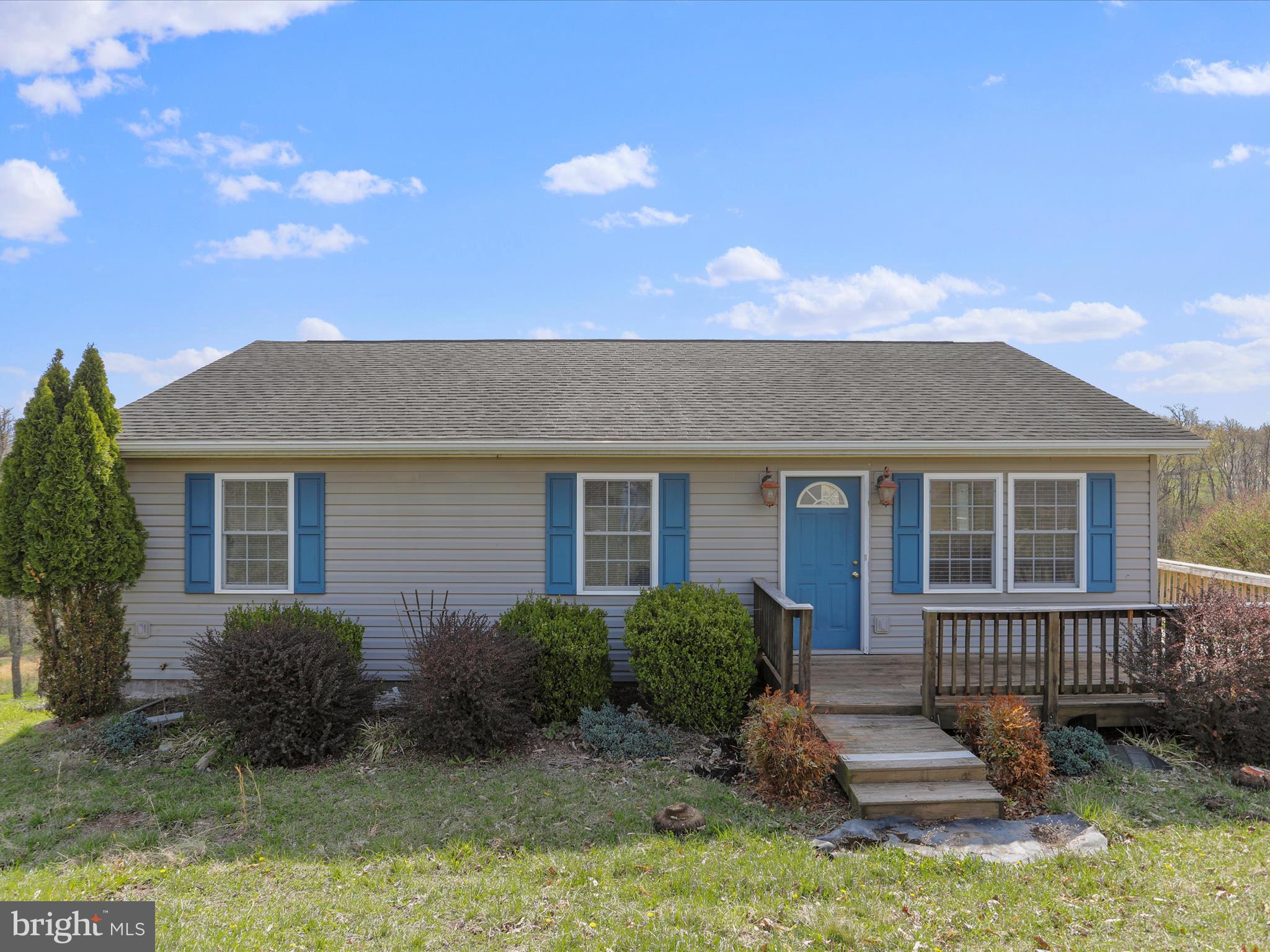 Solid, simple, and right where you want to be—316 E Ridge Loop Road in Romney, WV is the kind of place that just makes sense. Whether you’re buying your first home, looking to downsize, or just want something low-maintenance and close to town, this one checks a lot of boxes. Set on a generous 0.78-acre lot, this ranch-style home offers 1,120 square feet on the main level, plus a full unfinished basement that gives you the flexibility to expand, store, or create the workspace you’ve always wanted. Inside, the home features 3 comfortable bedrooms and 2 full bathrooms. Hardwood floors run through the main living area, adding warmth and character, while a heat pump and central air keep things comfortable in every season. The layout is straightforward and efficient—easy to maintain and easy to live in. Step out back and you’ll find a rear deck that’s perfect for weekend cookouts or winding down after work. A small front porch gives you a nice spot for morning coffee or just watching the day go by. The lot has enough space for a garden, a fire pit, or just some peace and quiet. Location-wise, it’s tough to beat. You’re just minutes from the hospital, shopping, and local schools, and if you need to head into Virginia, you’re less than an hour from Winchester. Whether you’re staying local or commuting, this home puts you in a convenient spot without giving up that small-town feel. It’s a solid home with good bones, in a great location, and ready for its next chapter. Come take a look—you might just find what you’ve been looking for.
