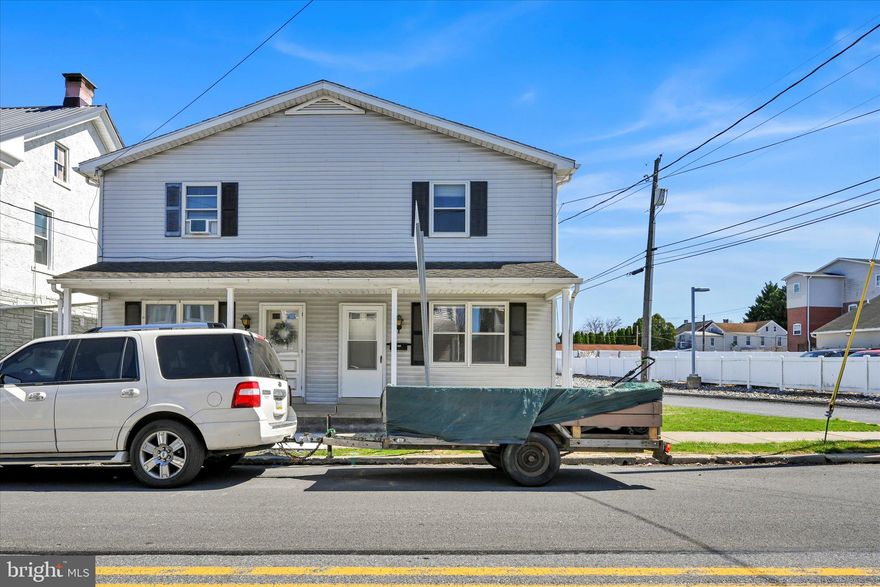 This charming property offers the best of both worlds. Live in one unit and earn rental income from the other! Each unit features 2 cozy bedrooms and 1.5 bathrooms. The large eat-in kitchen is perfect for preparing meals and hosting gatherings, while the inviting living room provides a comfortable space to relax. Another standout feature that makes this property truly one-of-a-kind is the incredible 6-bay garage, currently rented out and providing even more income potential! With plenty of space for storage, vehicles, or additional rental opportunities, this garage adds a fantastic layer of value to an already promising investment. This property is a rare gem that perfectly blends comfort, functionality, and profitability!