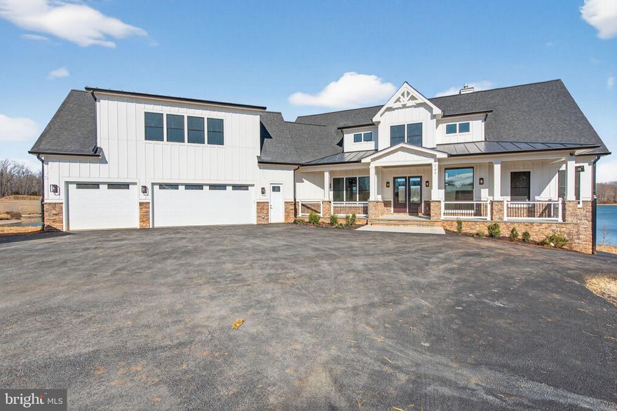 ROCK ISLAND LANDING  LAKE ANNA NEWEST SUBDIVISION  ***  New Construction to be your dream Stunning waterfront home set in a private Paradise. This unique, exceptional waterfront home offers a beautiful custom home. It's the perfect getaway in the heart of Virginia. Live your dream in an estate surrounded by natural beauty and nestled on the shores of one of Virginia's Largest lakes. The setting is ideal with a flat, comfortable elevation that provides beautiful views and is perfect for a walkout basement and gorgeous Sunset views! ,   Direct lake access & a beautiful private yard. No detail, grand or small was overlooked in the design & construction of this home; absolutely stunning   This waterfront home has over 6,815 square feet of living space on all 3 levels with 7 Bedrooms, 7 Full Baths,  2 half,3-stop elevator shafts, two screened porches, and a sundeck that walks out from the family room, two balconies on the third level. The main level features an open floor plan with 10' ceilings. The dramatic two-story ceiling in the great room and dining area is flanked by screened porches and a deck area, perfect for large-scale entertaining. The modern-styled kitchen has premium stainless steel appliances and quartz countertops. The luxuriously appointed master suite with a stunning master bath comes with marble tiles,  a freestanding bathtub, a luxurious shower, and a private screened porch that looks out to the lake. The main floor also offers two spacious bedrooms with a full bath, one of the bedrooms has a private screened porch that looks out to the lake, and 1st-floor laundry completes the impressive main floor living space. On the upper level, there is another three-bedroom  two of the suite that comes with one full bath and one balcony for each room that looks out to the lake, 9ft ceiling-high. Expansive lower-level walkout features outstanding recreation space with a full kitchen/bar, 2 additional bedrooms , and a fireplace. Multiple decks screened-in porches, and luxurious finishings throughout the entire home. There is still time to make this home uniquely yours. Select interior, exterior like stone, Hardie, colors, and upgrades, and an optional elevator. This property is located on the private side of  Lake Anna.  Other floor plans and waterfront lots are available please call the real estate agent for more info.* * * NOTE: THE PICTURES THAT ACCOMPANY THIS LISTING ARE REPRESENTATIVE OF THE QUALITY OF WORK AND THE FEATURES AND UPGRADES AVAILABLE TO THE BUYER. * * *