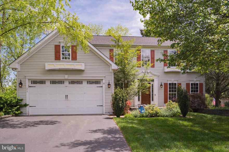 You already love the Phoenixville area and community vibe.  You may already know and love the Riverwalk Community….so this could be the one for you!  Starting with curb appeal, you won’t miss the brand new Therma-Tru Front Entry Door with Sidelights and Transom Window, followed by a welcoming 2 story foyer with wainscoting and hardwood leading the way through the main level.  To the left is the spacious Family Room with rich Bamboo Hardwood Flooring, plenty of natural light filtering in from the wall of windows, and cozy gas fireplace.  The kitchen is laid out well with functionality and efficiency in mind, but it’s the attractive granite counters, tile backsplash, large kitchen island, stainless appliances, soft close cabinets, recessed lighting and gas cooking that give the added value and beauty to the room.  The bump out Breakfast Room is striking and inviting with the vaulted ceiling and Palladian windows providing a private view of the changing seasons, and you can step right outside to your deck to enjoy the outside air or head down the spiral staircase to that amazing stone patio.   A formal Dining Room with crown molding and chair rail, and a formal Living Room (currently used as a home office) complete the main level.  The lower level is well designed and offers plenty of open space, a walk out straight to that gorgeous stone patio via newly installed exterior French Doors , a “WOW” theater room with elegant interior French door entry, built in displays, and recessed lighting.  The lower level also has a wet bar and separate room for wine making, and plenty of storage with a workshop area.  The second level features a spacious Primary Bedroom with a walk-in closet and a uniquely designed Primary Bath featuring a luxurious walk-in tiled shower with a ceiling mounted rainfall shower head, multiple body jet sprayers and handheld rinse, double sinks with tiled backsplash and upgraded cabinetry.  Three additional bedrooms and hall bath – all with hardwood flooring throughout complete the second level.  A spacious two car garage with additional storage and inside access through the laundry room on the main level are also worth noting.  This Home is move-in ready with a new roof installed in the Spring of 2020!