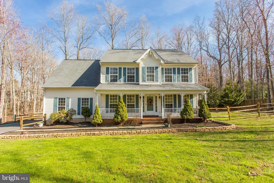 Lake Community! Gorgeous Colonial on 1/2 Acre Lot! Stunning and move in ready! Awesome tiered deck and fenced backyard. Gas fireplace in the family room, new hardwood on main level, new stainless appliances, updated lighting and custom blinds. Cozy front porch with swing. Spacious master bedroom with skylight, and huge walk-in closet. Soaking tub & separate shower in master bath.  Great front yard