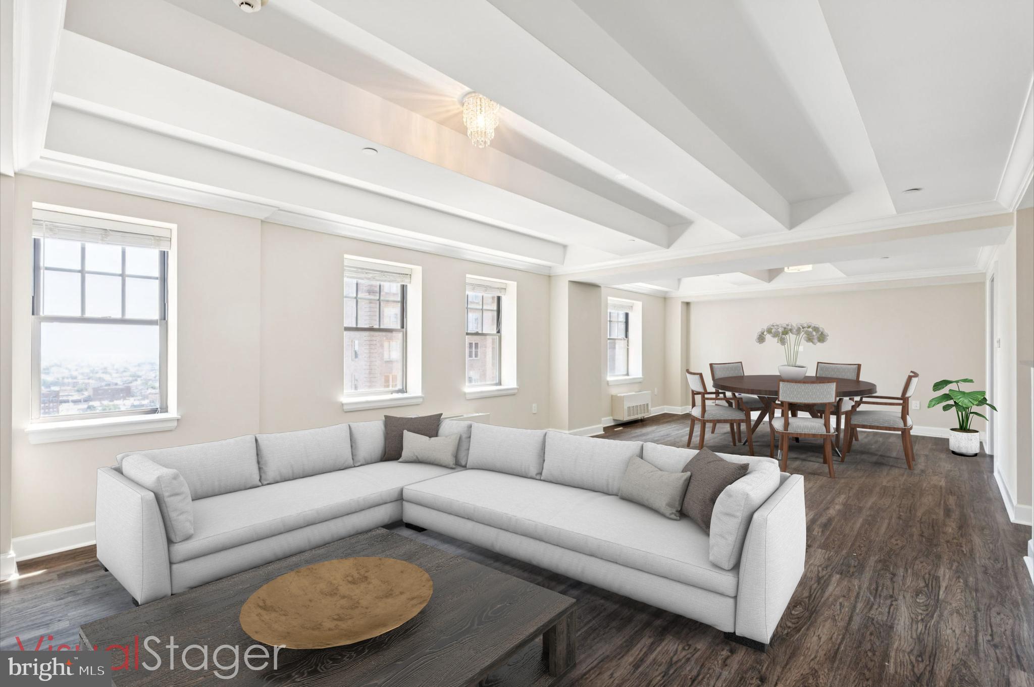 Grand 3 bedroom, 3.5 bathroom with city skyline views on a high floor of the highly coveted Warwick, steps away from Rittenhouse Square! Enter this luxurious home through a gallery foyer with ample space for displaying artwork. There is a light-filled living room with coffered ceilings that sits adjacent to a separate dining area. Located off of the great room, there is a den that can be utilized as a home office or entertainment center. Nearby, the updated kitchen features stainless steel appliances, granite countertops and a breakfast bar. The luxurious primary suite enjoys use of his and hers walk-in closets and a large ensuite bath with an oversized vanity that has double sinks, glass enclosed stall shower and soaking tub. Bedrooms 2 and 3 have great closet space and their own ensuite designer bathrooms. Additional home highlights include a laundry room with a stackable washer/dryer, excellent storage space throughout and a powder room upon entrance of the home. Residents of The Warwick enjoy the same amenities as guests of The Warwick Hotel, which is on the thirteen bottom floors of the building. Amenities include a 24-hour doorman, state-of-the-art fitness room, and valet parking for an additional fee.