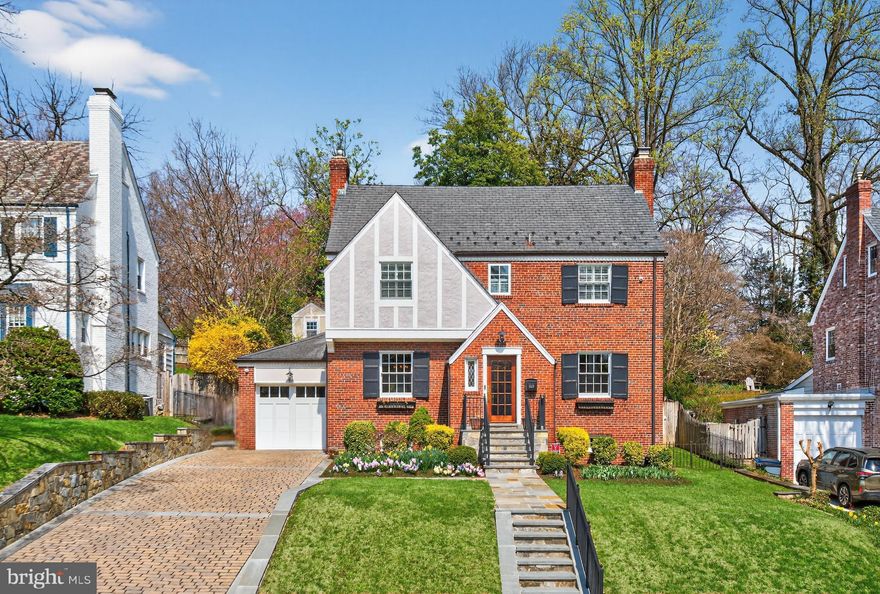 Welcome to 3525 Woodbine Street – an exceptional, fully reimagined Tudor in the heart of Chevy Chase, where timeless architecture meets modern luxury and everyday convenience.

Meticulously renovated and expanded, this home offers a rare, truly move-in ready opportunity for buyers seeking elegance, functionality, and peace of mind. A striking two‑story rear addition anchors the property, creating an extraordinary gourmet kitchen and family room with built-in sound system designed for both elevated entertaining and relaxed daily living. Seamlessly opening to a generous terrace, this space invites effortless indoor-outdoor living in a private, beautifully landscaped setting.

From the moment you enter, the gracious center hall reveals sightlines that extend to the lush backyard, setting a tone of openness and sophistication. The main level features a formal living room with a gas fireplace and custom built‑ins, an elegant dining room, and a well‑appointed butler’s pantry ideal for hosting. A mudroom with direct garage access enhances everyday ease and practicality.

Upstairs, the luxurious primary suite serves as a serene retreat, complete with a spa‑inspired bath featuring a soaking tub, skylight, double vanity, heated floor, and glass‑enclosed shower with steam shower. Three additional bedrooms and two renovated baths offer comfort and flexibility for family or guests. The lower level includes a bright recreation room, ideal for play, fitness, or movie nights, along with ample storage including a wine cellar, and an additional powder room.

Outdoors, the expansive, fenced backyard is a private haven complete with mature landscaping, beautiful trees, a broad lawn, and a charming tree house. Expertly executed hardscaping, highlighted by stone walls built from locally sourced quarry stone, elevates the terrace, where a wood‑burning fireplace and a built‑in gas grill with a dedicated gas line and storage create an effortless, year‑round entertaining environment.

Extensive upgrades, including modern HVAC, updated electrical systems, premium cabinetry, and high‑quality finishes throughout, underscore the home’s turnkey appeal.

Perfectly positioned for a lifestyle of convenience, the home is moments from boutique shopping and dining along Brookville Road, the beloved Taylor Street farmers market and the scenic trails of Rock Creek Park. Enjoy nearby recreation at Candy Cane City and Meadowbrook Stables, as well as easy access to the vibrant Chevy Chase Lake district and Chevy Chase Circle shopping and dining. Commuting is effortless with close proximity to the Metrobus, the Metro’s Red Line and the forthcoming Purple Line connecting to Bethesda and College Park.

Offering a rare blend of refined design, scrupulous upgrades, and an enviable location known for its charm, safety, and accessibility, this home represents luxury living at its most compelling.