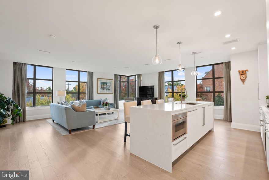 Extraordinary lifestyle at Robinson Landing. This very rare CORNER 2-bedroom 2-bath residence with 3 sides of windows, is in Old Town's premiere luxury community located on the waterfront in the heart of the historic district.  Sited amidst restaurants, coffee shops, retailers and City parks, this sun-drenched, 1,600 square foot home has luxurious finishes throughout. Enjoy custom window treatments, Snaidero kitchen cabinets, Thermador appliances, quartz countertops and 5 inch oak plank flooring in all rooms, Private balcony with gas hookup for grill, 2 garage spaces with EV charger, very large storage room, and semi-private elevator to your floor (elevated living with only 2 residences per floor). Building has great privacy and security. Robinson Landing is Old Town's most luxurious community with a platinum location and top tier amenities. The owner's lounge, library, meeting room, game room,  gym and yoga studio all have amazing water views. The same building houses the concierge desk, pet spa, kayak storage and bike storage/workshop. Dine in the waterfront restaurants, stroll along the boardwalk, shop at the Farmers Market and start enjoying life. All just minutes to Reagan National Airport, Amazon HQ2, the Capitol and all D.C. has to offer. Don't miss this amazing lifestyle opportunity!