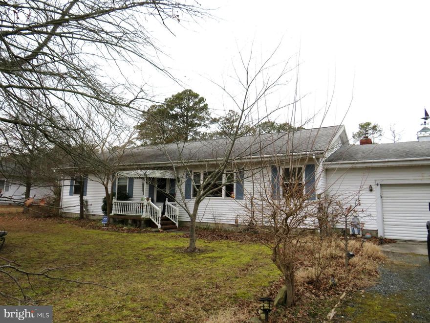 Waterfront home located just outside of Crisfield.  Built in 1989, needs some updating.  Has three bedrooms, two full baths, an attached garage, sun porch and large storage barn.  Fenced rear area for the critters or the kids and a carport for the car or the boat.  Launch the boat at your own ramp, and park it at the protected dock so it is ready for boating adventures!  Central air and hot water baseboard oil heat with a recently replaced nitrogen removing septic system.