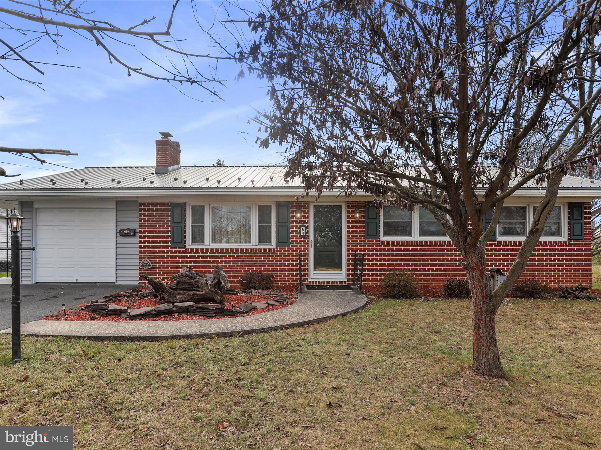 Step inside and fall in love with this meticulously maintained, one level, brick rancher. Move in ready! This charming home boasts beautiful oak hardwood flooring throughout. The extra large room in the rear of the home can offer multiple different uses- family room, formal dining room, play room, large primary bedroom, You name it! Eat in kitchen with lovely wood cabinets and newer matching appliances. Easy access to the main level laundry room makes this home one to appreciate. Each bedroom offers natural lighting through windows. The spacious living room boasts plenty of space for furniture and hosting gatherings. Stay warm and cozy during these frigid months with extra heat from the wood burning fire place. Make your way into the basement and be pleased with the amount of extra storage space. More than enough potential for future expansion in the basement. Come appreciate the gorgeous landscaping this property provides as well as the oversized storage shed. Newer metal roof, water heater, 200 amp panel box and boiler cleaned this year. Schedule your showing today!