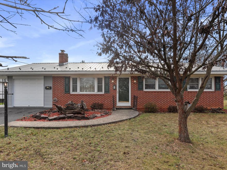 Step inside and fall in love with this meticulously maintained, one level,  brick rancher. Move in ready! This charming home boasts beautiful oak hardwood flooring throughout. The extra large room in the rear of the home can offer multiple different uses- family room, formal dining room, play room, large primary bedroom, You name it! Eat in kitchen with lovely wood cabinets and newer matching appliances. Easy access to the main level laundry room makes this home one to appreciate. Each bedroom offers natural lighting through windows. The spacious living room boasts plenty of space for furniture and hosting gatherings. Stay warm and cozy during these frigid months with extra heat from the wood burning fire place. Make your way into the basement and be pleased with the amount of extra storage space. More than enough potential for future expansion in the basement. Come appreciate the gorgeous landscaping this property provides as well as the oversized storage shed. Newer metal roof, water heater, 200 amp panel box and boiler cleaned this year. Schedule your showing today!