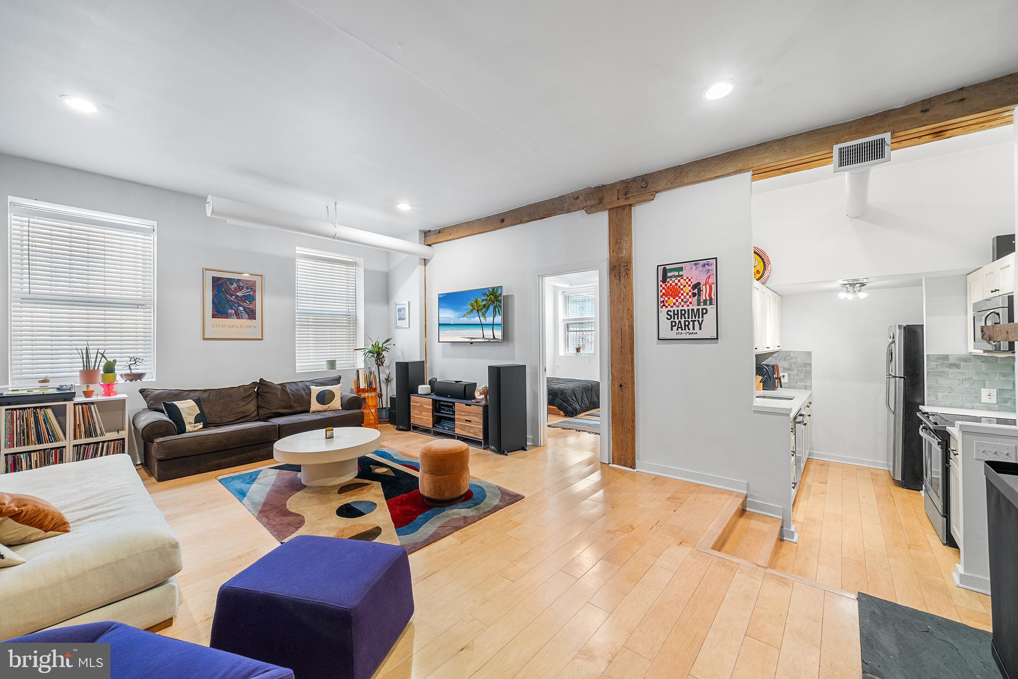 Tucked in Historic Headhouse Square down a cobblestone alley, this character-rich loft is the urban hideaway you've been dreaming of. Unit A blends industrial vibes and warm textures—exposed brick walls, soaring ceilings, and wide-open space just begging for your creative touch.
This 2-bedroom, 1-bath condo is quietly bold, with its own secured, COVERED PARKING SPOT (a rare gem in Philly). Step through the private carport entrance and right into the building—no stairs, no hassle.
Inside, you’re greeted by a stunningly open layout that’s equal parts gallery, studio, and sanctuary. Imagine a long table for dinner parties, a studio corner for painting or photography, or a full-on vinyl-listening lounge. The modern galley kitchen keeps things sleek and efficient, while just beyond, a second open living area features a wood-burning fireplace and oversized windows keeping the ambiance grounded in the best way.
The primary bedroom offers space to breathe, with two big windows, a full closet, and room for your dream setup. The adjacent bath includes a stacked washer/dryer, tiled shower/tub, and water closet, all in a smart circular flow that feels intuitive and easy.
A second room just off the entryway makes the perfect guest room, home gym, or creative workspace—whatever your lifestyle calls for.
Location-wise, you’re in the sweet spot: walkable to Queen Village, Old City, and the Delaware River waterfront, surrounded by galleries, boutiques, and some of the best food scenes in the city. Plus, you’ve got easy access to public transit and major highways when you need to get out of town.
This is more than a condo—it’s a canvas. Come make it your own.