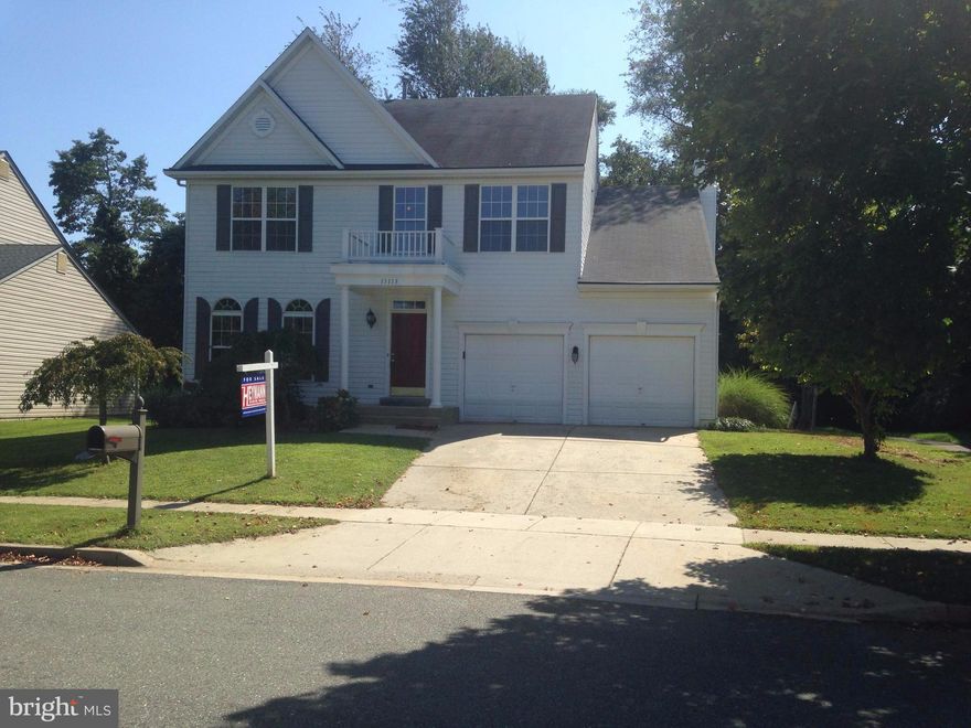 Awesome rehabbed property.  New paint, new carpeting, new kitchen include granite counter tops and new vanity, sinks and counter tops in the master bath.  Four spacious bedrooms and a bonus room in the basement,  Hardwood throughout the main level and upstairs. New Washer/Dryer on the top level. Large deck for entertaining. Looks better in person