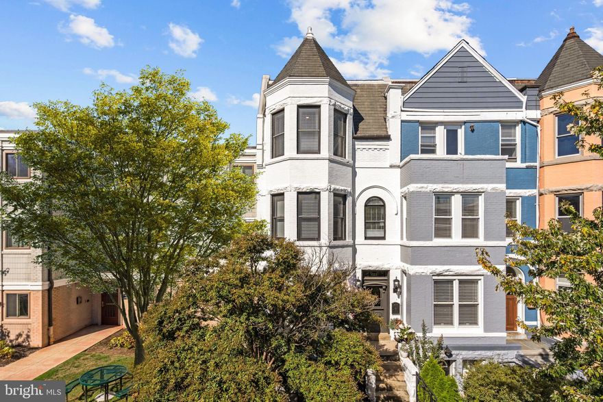 An Extraordinary Grand Victorian in the Heart of Columbia Heights could be yours. 

Welcome to this truly exceptional Grand Victorian townhouse, a seamless fusion of historic elegance and contemporary luxury, nestled in vibrant Columbia Heights/ U Street. Spanning four meticulously designed levels, this stately residence has been transformed by its architect-inspired owners into a one-of-a-kind custom home.

From the moment you enter, the attention to detail is evident. The heart of the home is a Chef’s Gourmet Kitchen—an entertainer’s dream—featuring dual 10-foot islands, matching Cafe Commercial stainless steel appliances which include a 6-burner gas cooktop with a powerful canopy hood. There is an abundance of storage within custom shaker cabinetry topped with stunning Calcutta Quartz counters from Cambria (the Highest grade was installed and has a lifetime warranty).

Though this early 20th-century gem already had strong architectural bones, the current owners envisioned more than a renovation—they undertook a full-scale transformation. What began as a kitchen and bathroom update evolved into a comprehensive reimagining, including brand new flooring throughout entire home, NEW HVAC/Central Heating system (previously radiator heating) drywall, electrical systems, staircases, and ceilings. Recessed and statement lighting fixtures have been installed throughout to bring warmth and sophistication to every room, especially the oversized bedrooms.

Original 1910 and updated wall moldings accentuate the soaring ceilings on each level, while rich textures and bold colors define the ultra-luxurious bathrooms. The home retains its original character with preserved wood-burning fireplaces, hallway entry mirrors, and stained glass in the living and dining rooms (Restoration Hardware chandeliers will convey), blending old-world charm with modern flair. Let's not forget the stunning wide plank engineered white oak flooring that has been installed throughout this fabulous home. 

Upstairs, a former bedroom has been reconfigured into a lavish walk-in closet for the primary suite, leading to what can only be described as a “bathroom of the century,” complete with leather-embossed wall finishes for an unforgettable spa-like experience.

A private, screened-in rooftop deck with fabulous views awaits just beyond the home office or guest suite—your perfect hideaway above the city.

The fully finished basement includes its own private entrance, offering endless flexibility as a guest suite, in-law apartment, or potential income-generating unit.