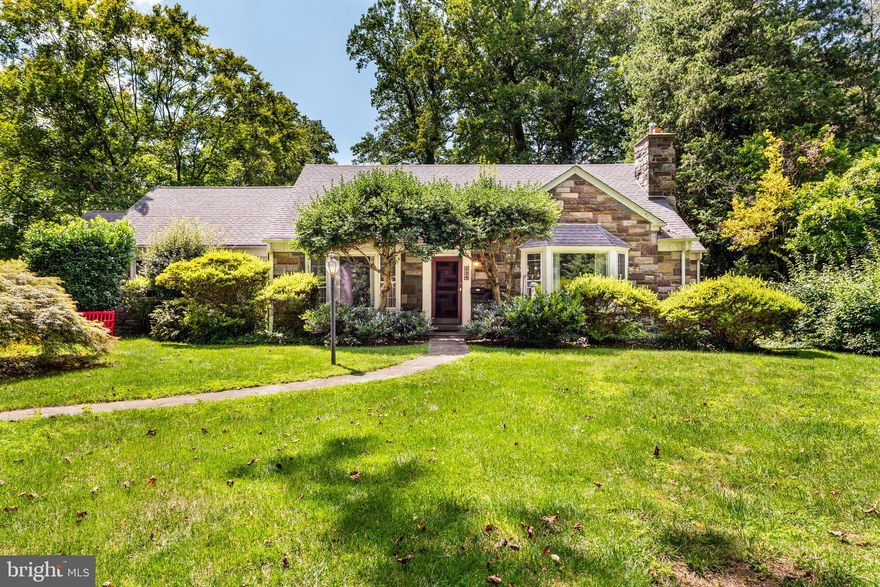 Welcome to this charming home in Wynnewood, offering a unique blend of character and potential. With 4 bedrooms and 3.5 baths, this spacious property features a first-floor primary bedroom and full bathroom,  a cozy living room with built-ins and a fireplace, and a formal dining room with a picturesque bay window. The second level holds three bedrooms and a full bathroom. The large back yard and stone patio provide plenty of outdoor space, while the partially finished walk-out lower level includes a built-in bar, flexible living space, full bathroom and access to the attached two-car garage. The east side of the home has a separate entrance and was formerly used as a professional office, giving it a versatile layout that can be customized to fit your needs. With its stone façade, newer roof, and incredible bones this property is the perfect canvas for your dream home. The location is unbeatable—close to Wynnewood train station, Ardmore train station with Amtrak service, South Ardmore Park, and Suburban Square with its world-class shopping, Farmer’s Market, and various coffee shops and restaurants. Lower Merion is known for its top schools, libraries, and nearby universities. Being sold in as-is condition, this home is a rare find for anyone looking to customize a home in a prime Main Line location.