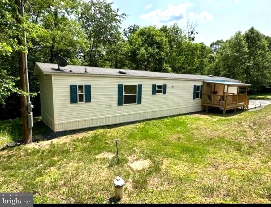 NEWLY RENOVATED HOME! COME AND SEE THIS HOME THAT IS MOVE IN READY. THE PROPERTY IS SET BACK NICELY OFF OF THE ROAD AND OFFERS PRIVACY WITH AMPLE OUTDOOR SPACE TO ENJOY. THE HOME HAS A BRAND NEW COVERED FRONT PORCH AND A NEW DECK ON THE BACK THAT OVERLOOKS THE WOODED LAND. THE HOME HAS NEW HVAC (CENTRAL HEAT & A/C), NEW FLOORING, FRESH PAINT, NEW DOORS, NEW WINDOWS, RENOVATED BATHROOMS, NEW APPLIANCES, NEW LIGHT FIXTURES, NEW CEILING FANS, AND A NEW 10 X 10 STORAGE SHED. *SELLER IS WILLING TO CONSIDER ASSISTANCE WITH BUYER LENDER'S FEES* 
*FHA FINANCING CAN BE CONSIDERED FOR THE PURCHASE OF THIS PROPERTY*