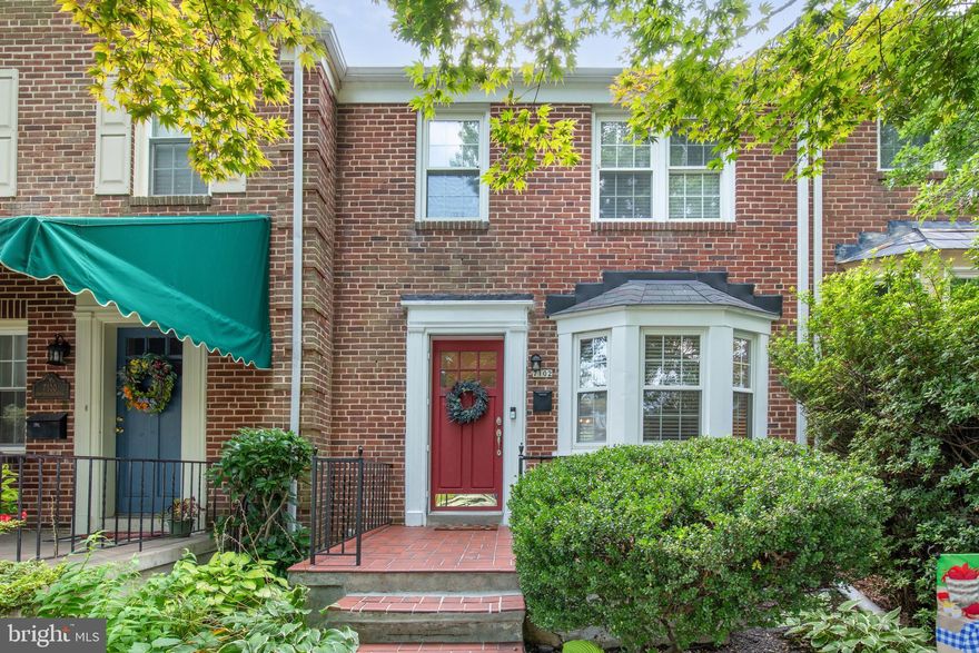 Welcome Home to the very desirable neighborhood of Rodgers Forge!   This charming Row House is move-in ready!  It has been beautifully cared for and it shows.  The welcoming front entryway opens up into a generous living room with wood floors, neutrally painted walls, bay window with seat, etc.  The dining room is spacious with built-ins, wood floors, plenty of light and looks out to the manicured, fenced-in back yard.  The kitchen has plenty of cabinets, was just painted, has a fabulous farmhouse sink, stainless appliances, gas cooking, etc.  The fridge is practically new and was purchased in 2024.  New blinds have been installed throughout the home in 2023.   The upper level has three bedrooms, one full bath, and has been painted with neutral tones, and is ready for your personal touches!  The upper level is very welcoming.  The entry to the lower level from the kitchen, brings you down to a very nice family room which has recently been painted, a laundry room with a new dryer purchased in 2025, a big storage room and half bath with a door out to the rear yard.  THE REAR YARD!  Your own private parking pad awaits you as well as a very nice sitting area, and a shed. This back yard is a very nice oasis in the neighborhood!  There is always plenty of parking on the street and having your own private parking pad is a definitely plus.  This is a historic neighborhood with rules and regulations and there is an optional HOA that you can join if you want.  This home and neighborhood is a gem and please call Co Listing Agent with any questions you might have.